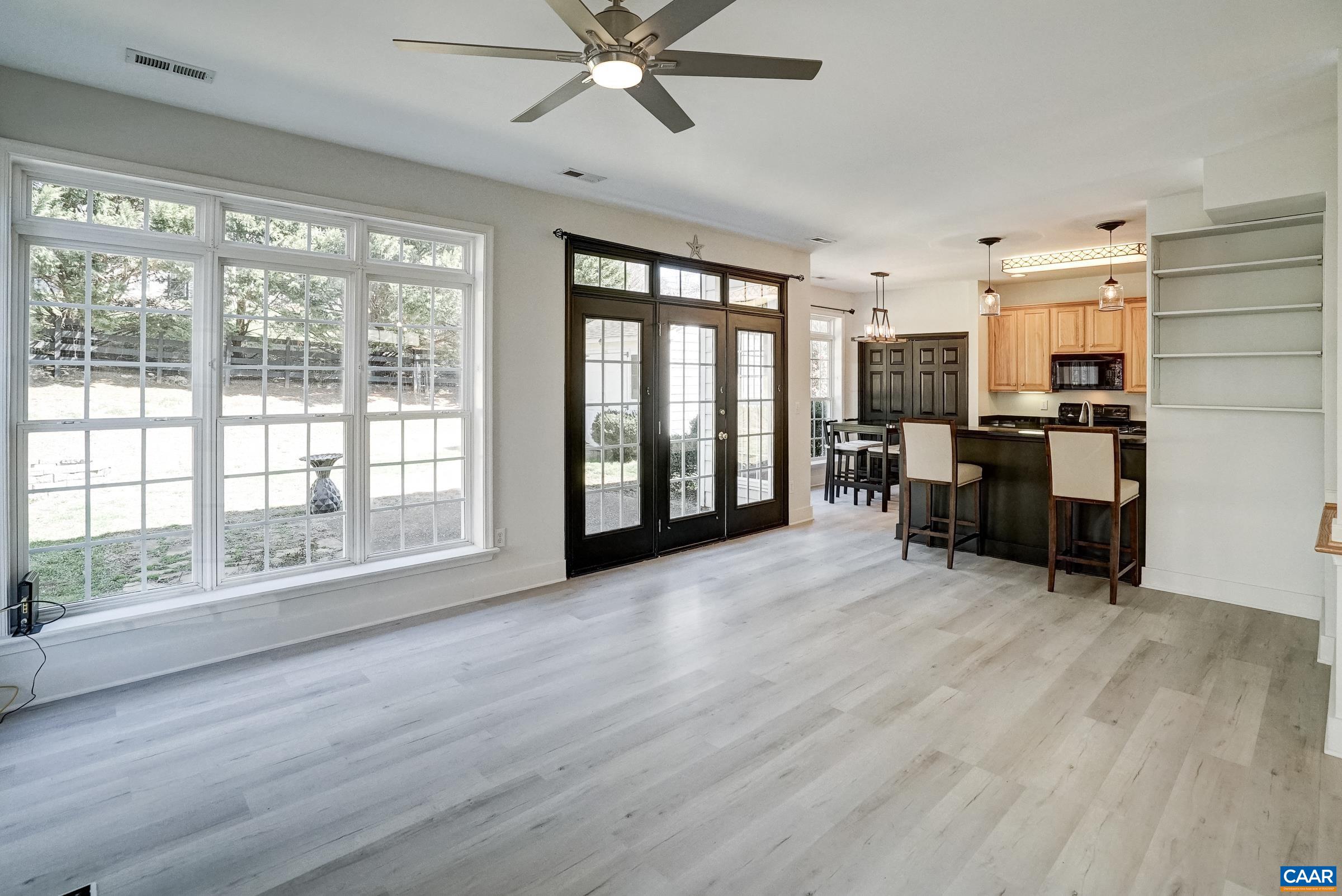 French doors lead to back yard. French doors lead to back yard.