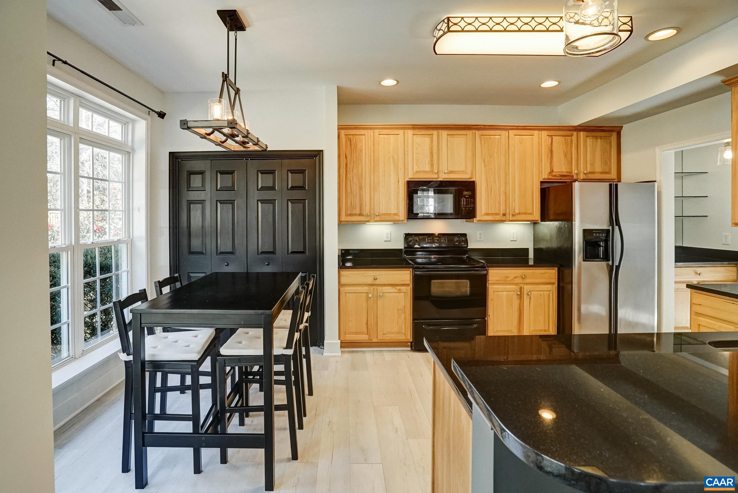 Kitchen and breakfast nook. Kitchen and breakfast nook.