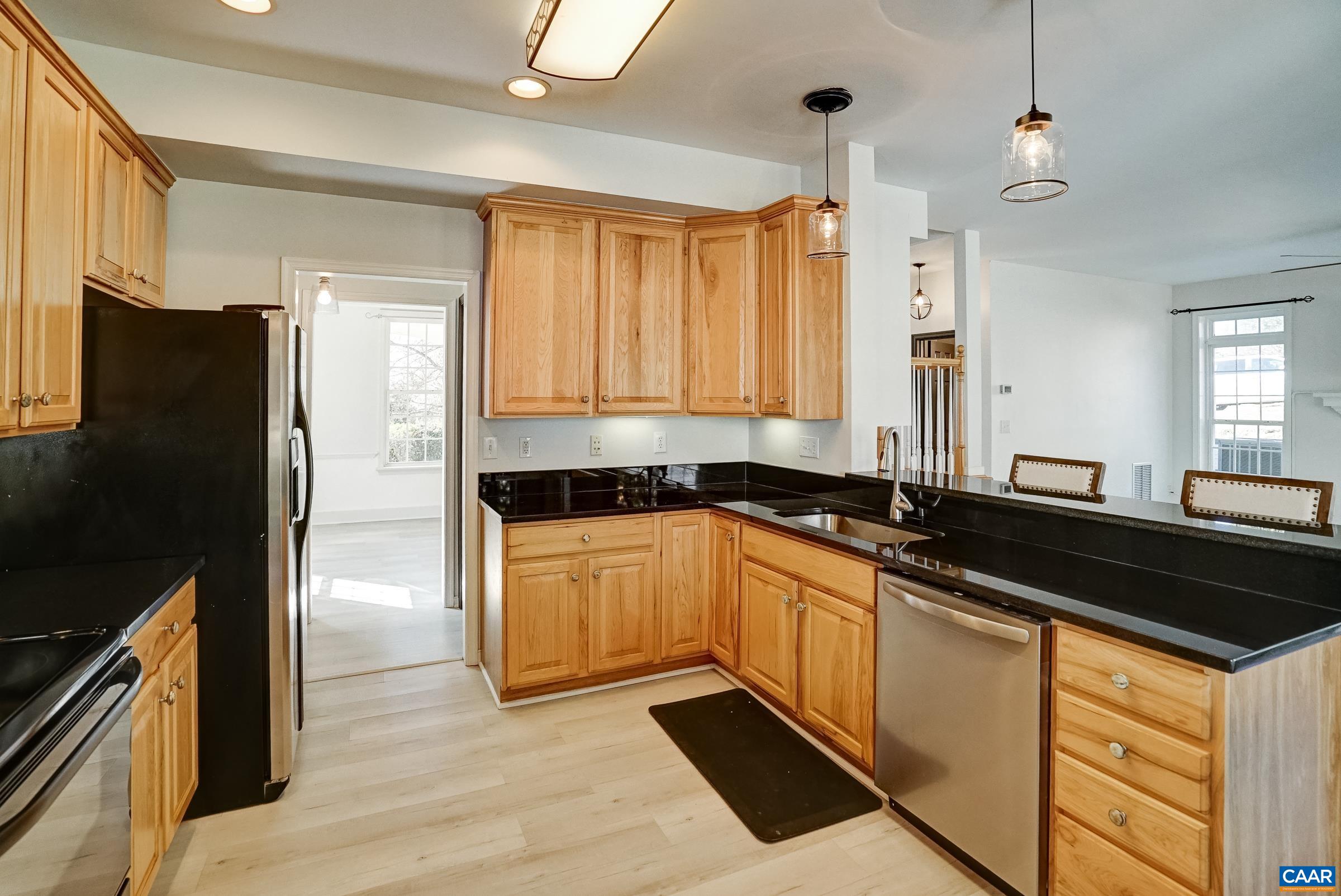 Updated kitchen features granite counters and new dishwasher. Updated kitchen features granite counters and new dishwasher.