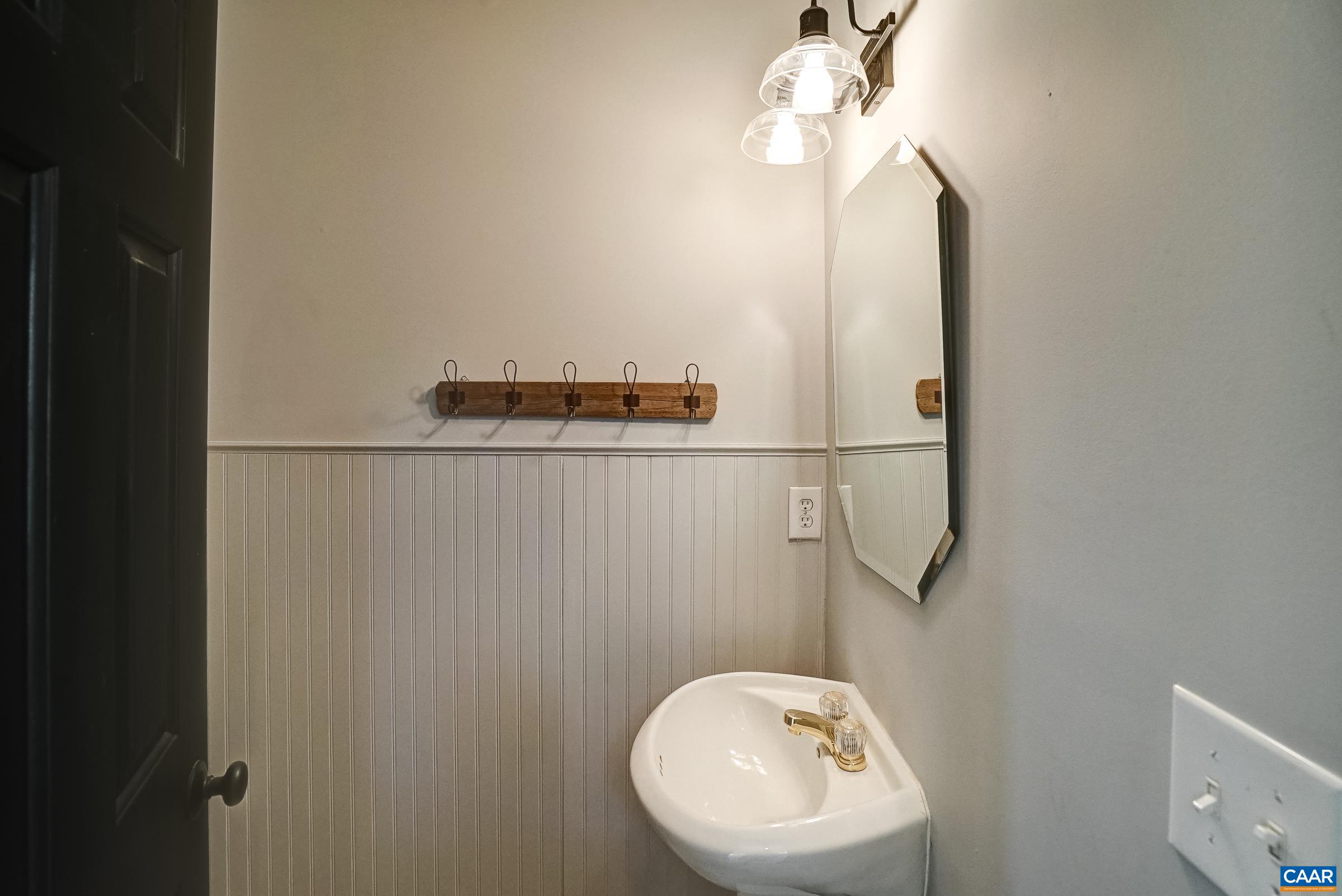 Main Level Powder room. Main Level Powder room.