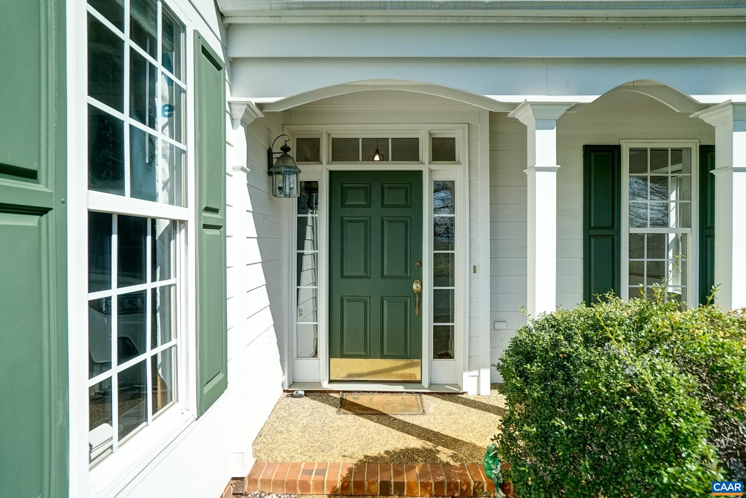 Charming covered porch with swing! Charming covered porch with swing!