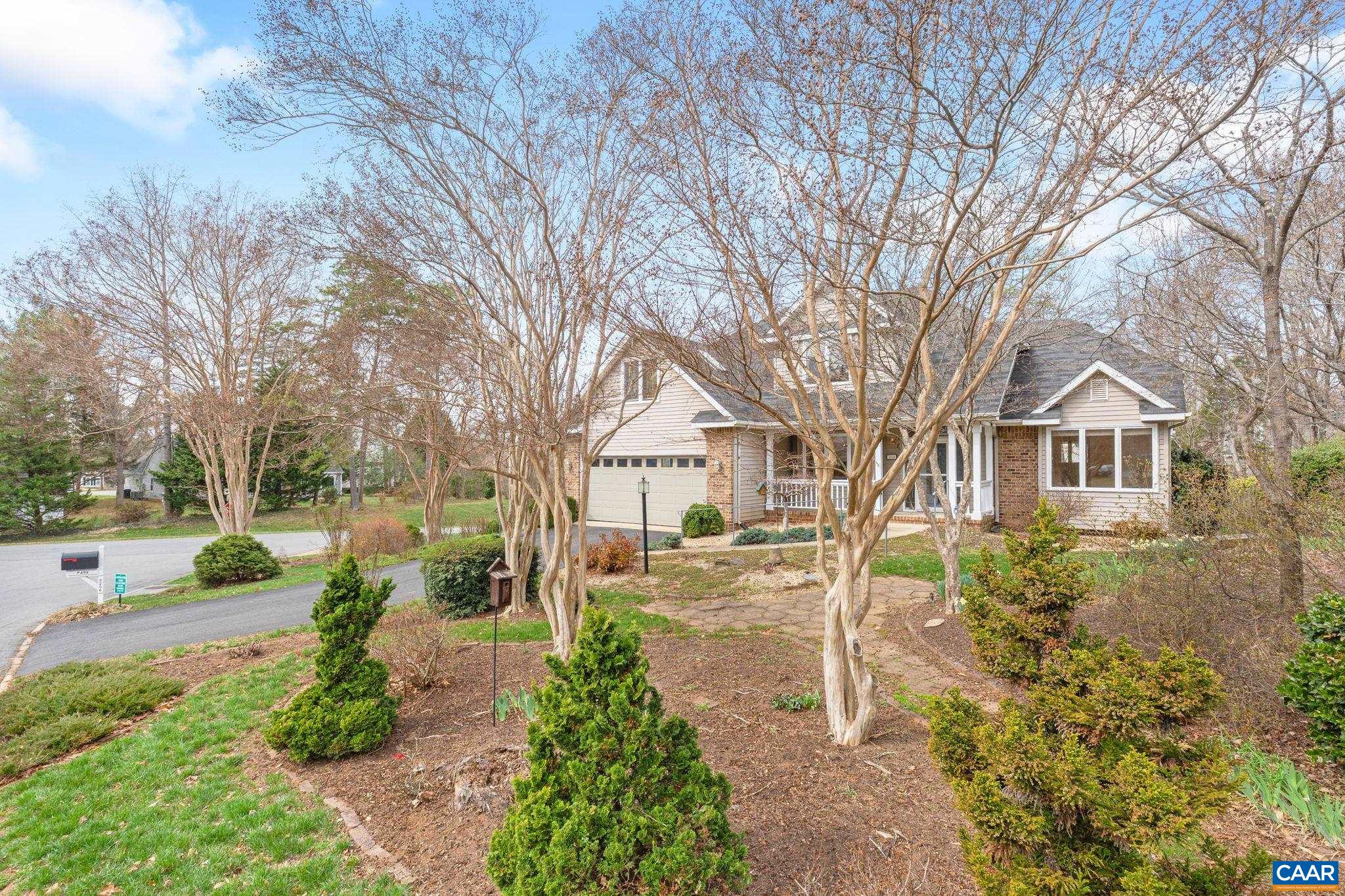 Main level living in Forest Lakes with 2 car on-grade garage and 3 additional bedrooms on the upper level.