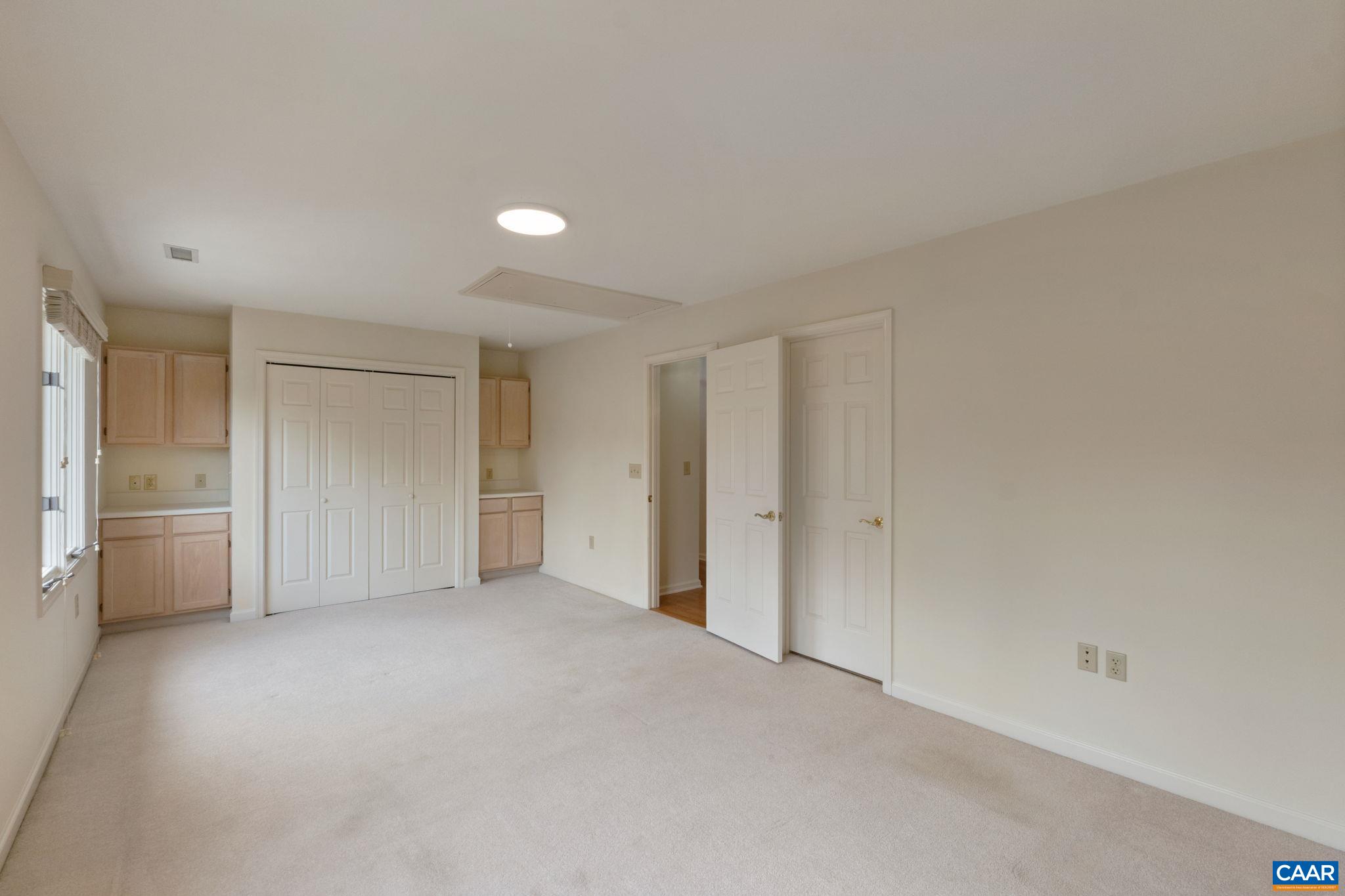 This bedroom also makes for a fabulous home office if needed