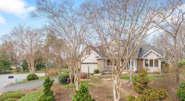 Main level living in Forest Lakes with 2 car on-grade garage and 3 additional bedrooms on the upper level.