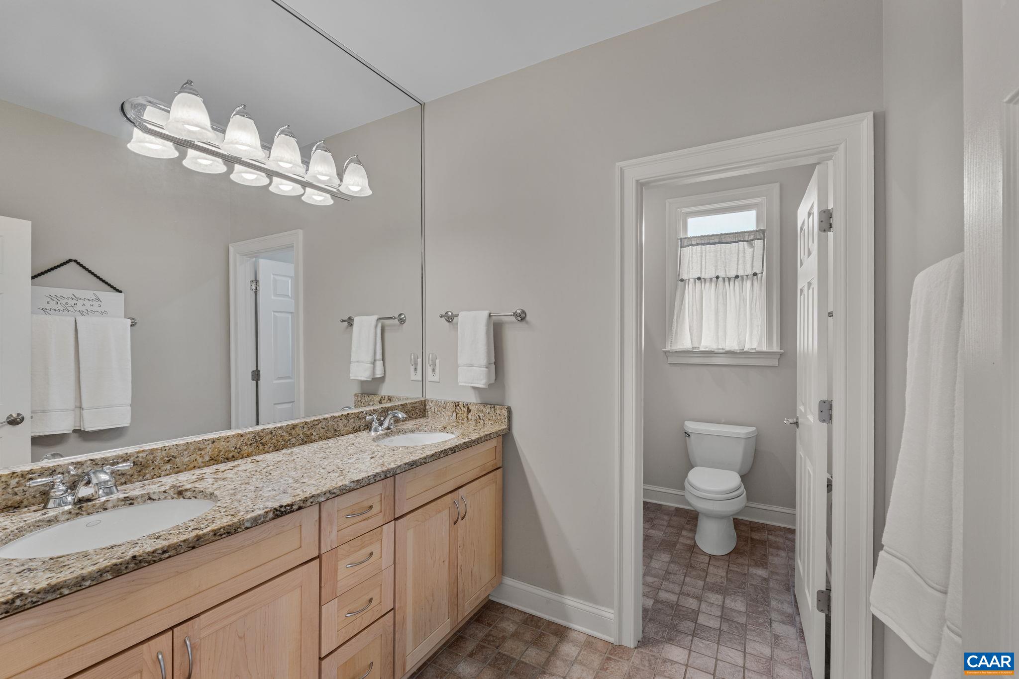 Home features a total of 4 full baths and 1 half bath