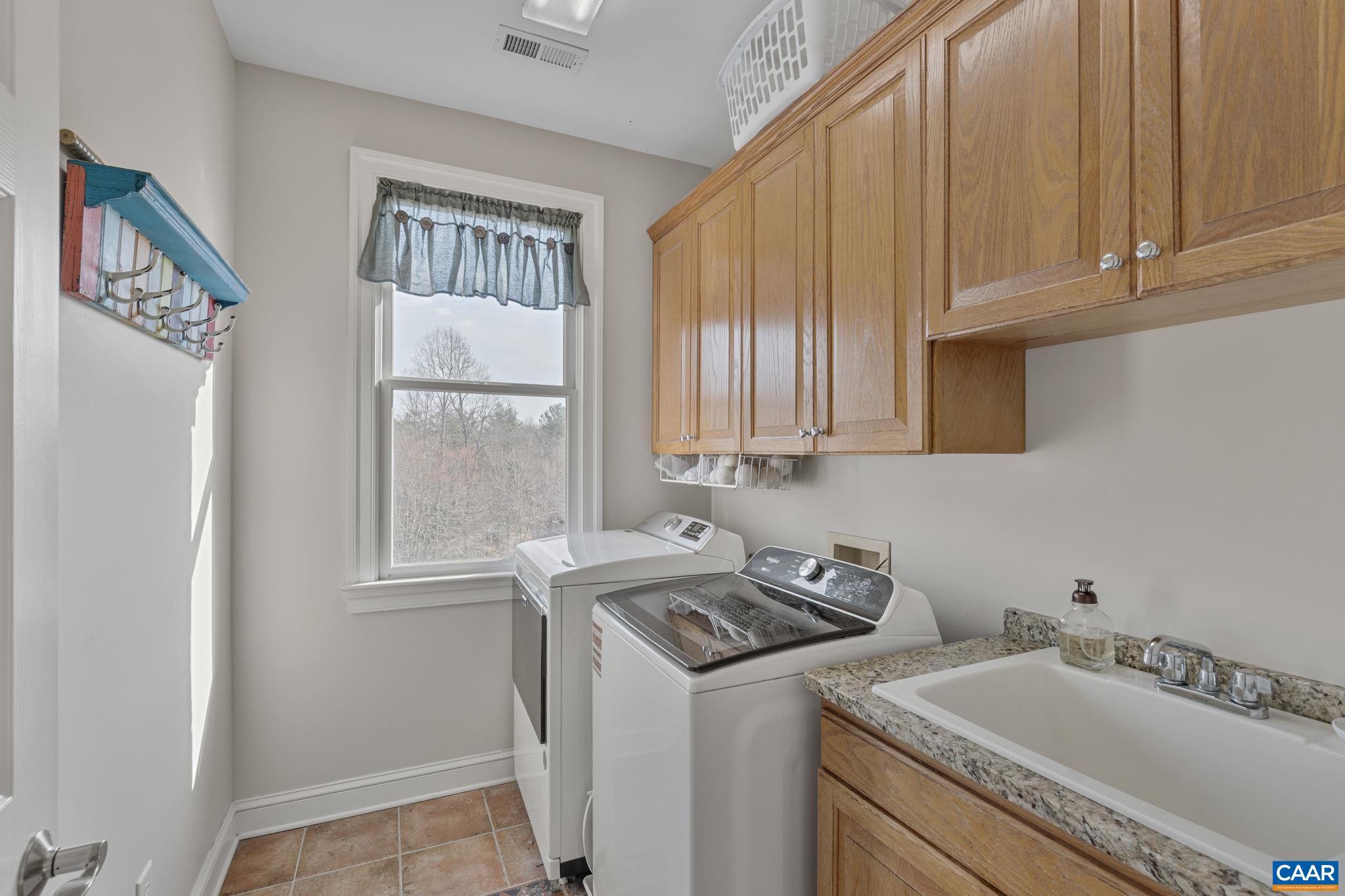 Laundry is conveniently located near the bedrooms