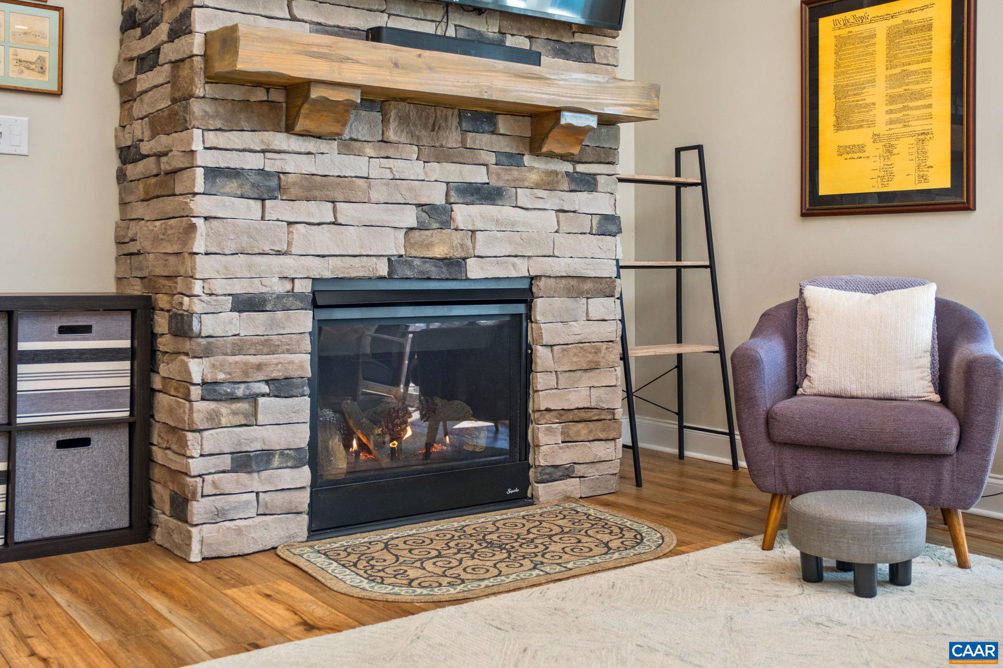 The gas-log fireplace has a switch to turn fireplace on and off, plus a blower. The great room features a vaulted ceiling. The gas-log fireplace has a switch to turn fireplace on and off, plus a blower. The great room features a vaulted ceiling.