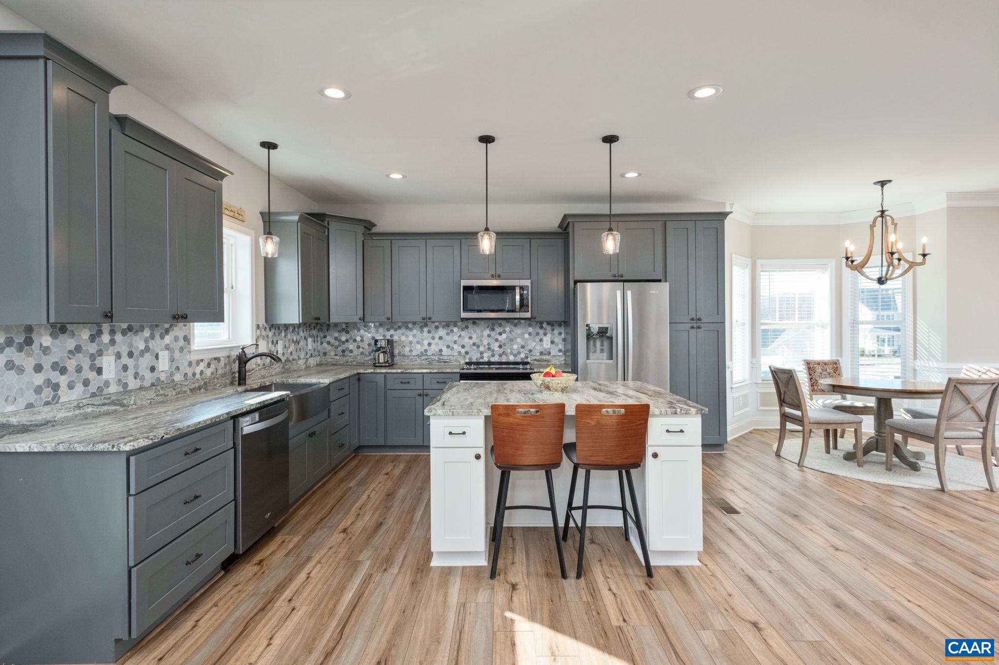 The kitchen also features an eat-in area with mountain views. The kitchen also features an eat-in area with mountain views.