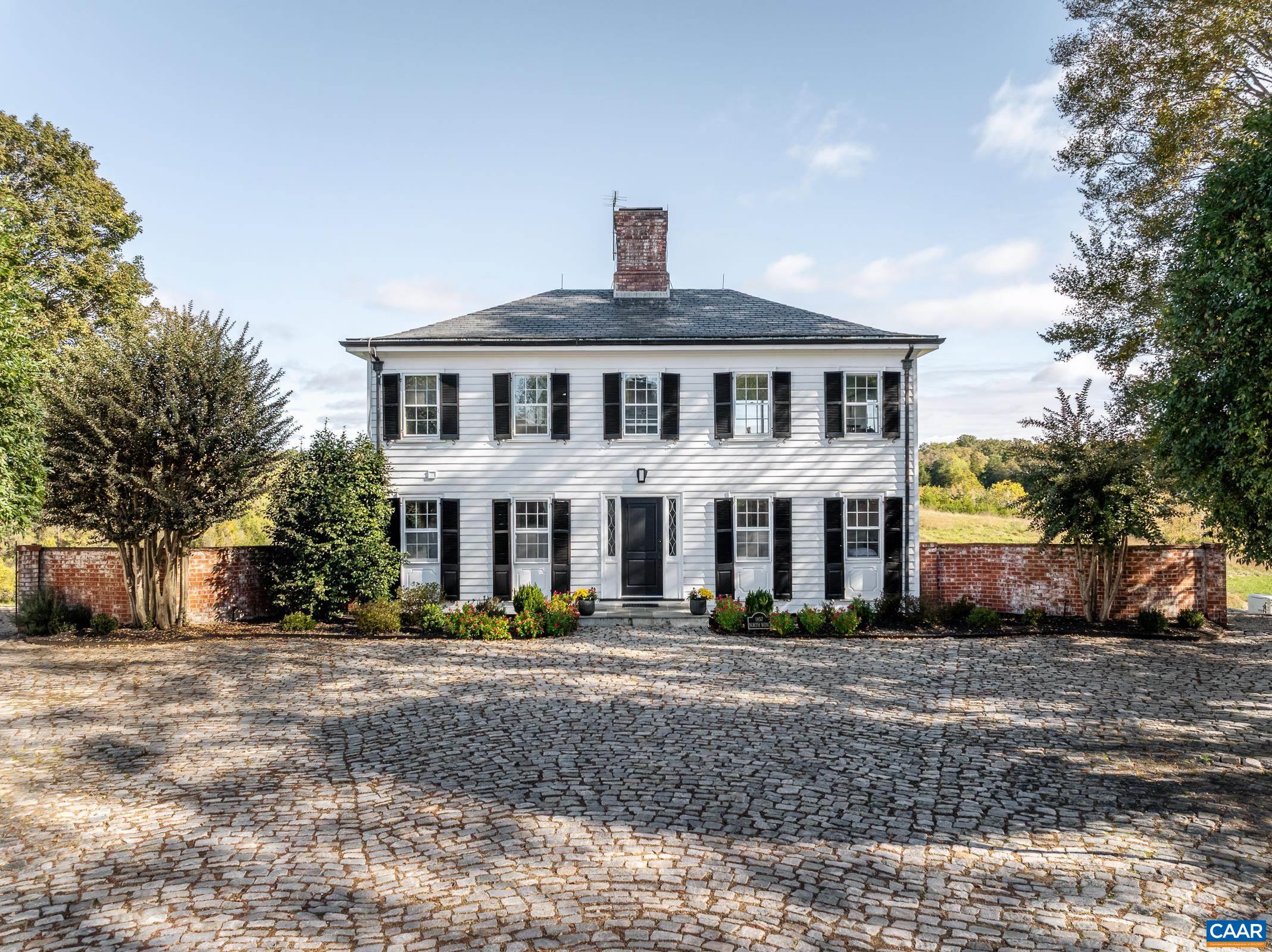Light filled with three bedrooms, two baths, a game room and kitchen with Viking stove.