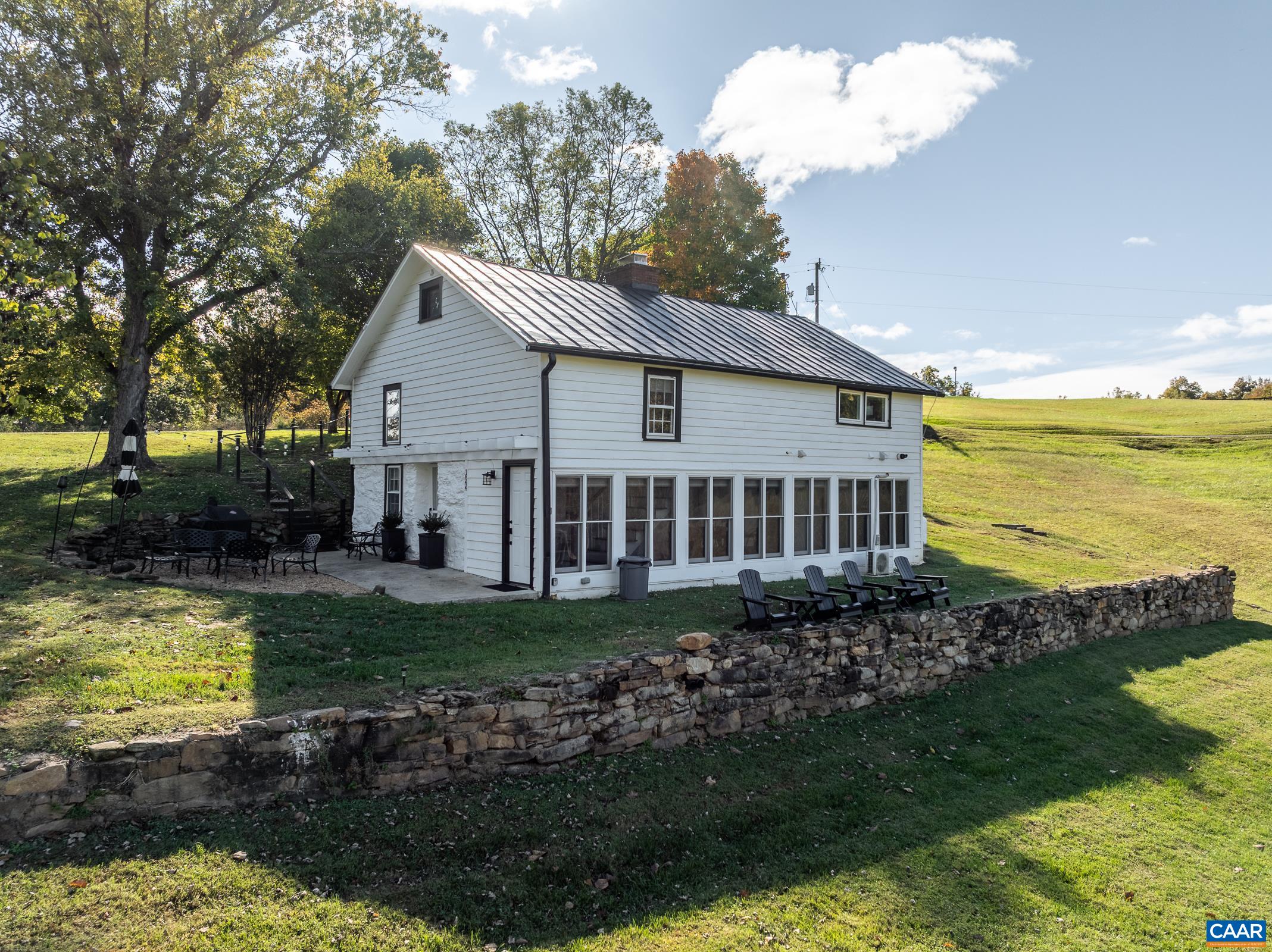 Tucked within its own landscaped enclave. This additional guest home offers a charming retreat.