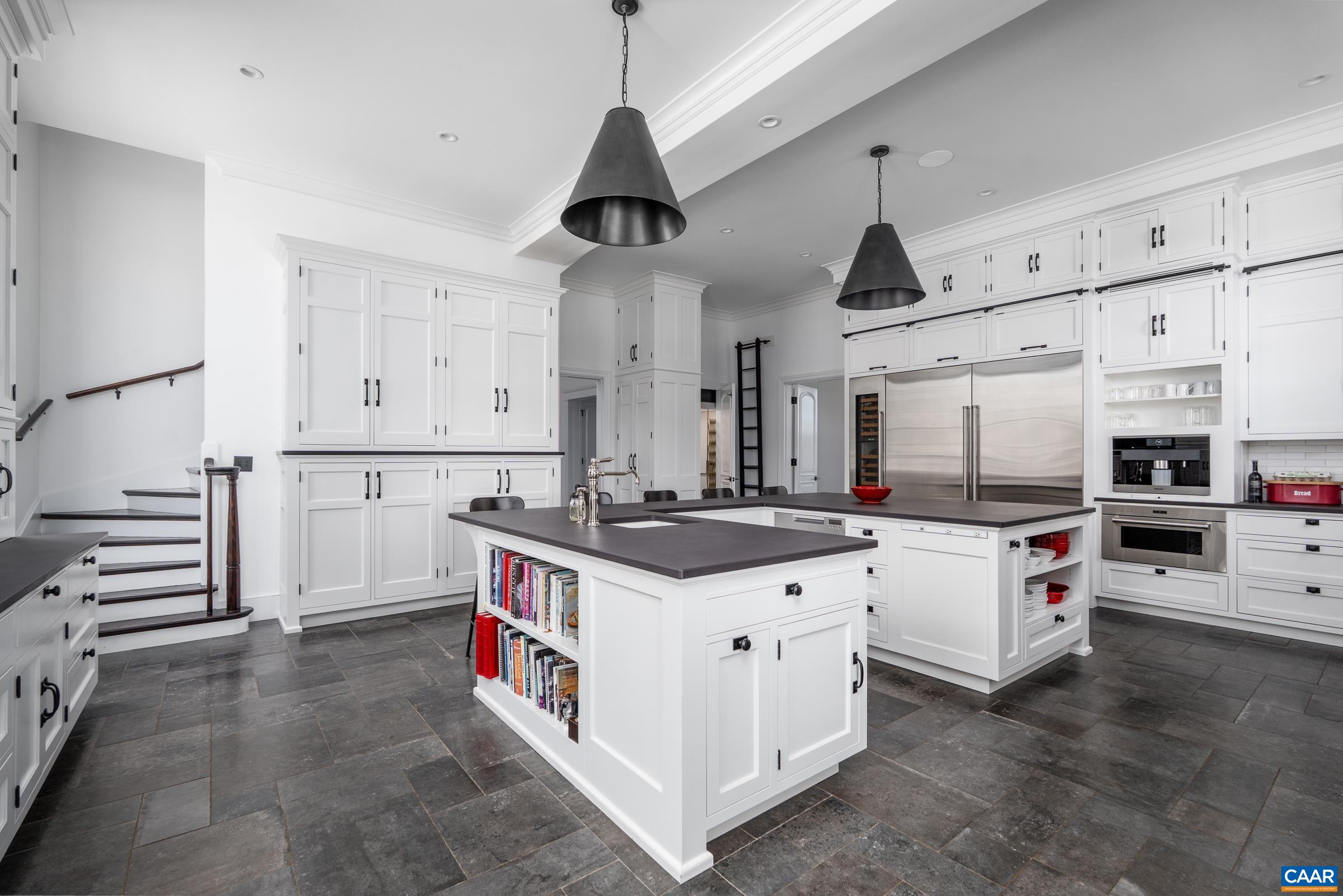 Wolf/Sub-Zero kitchen with Dekton counters and numerous custom built-ins.