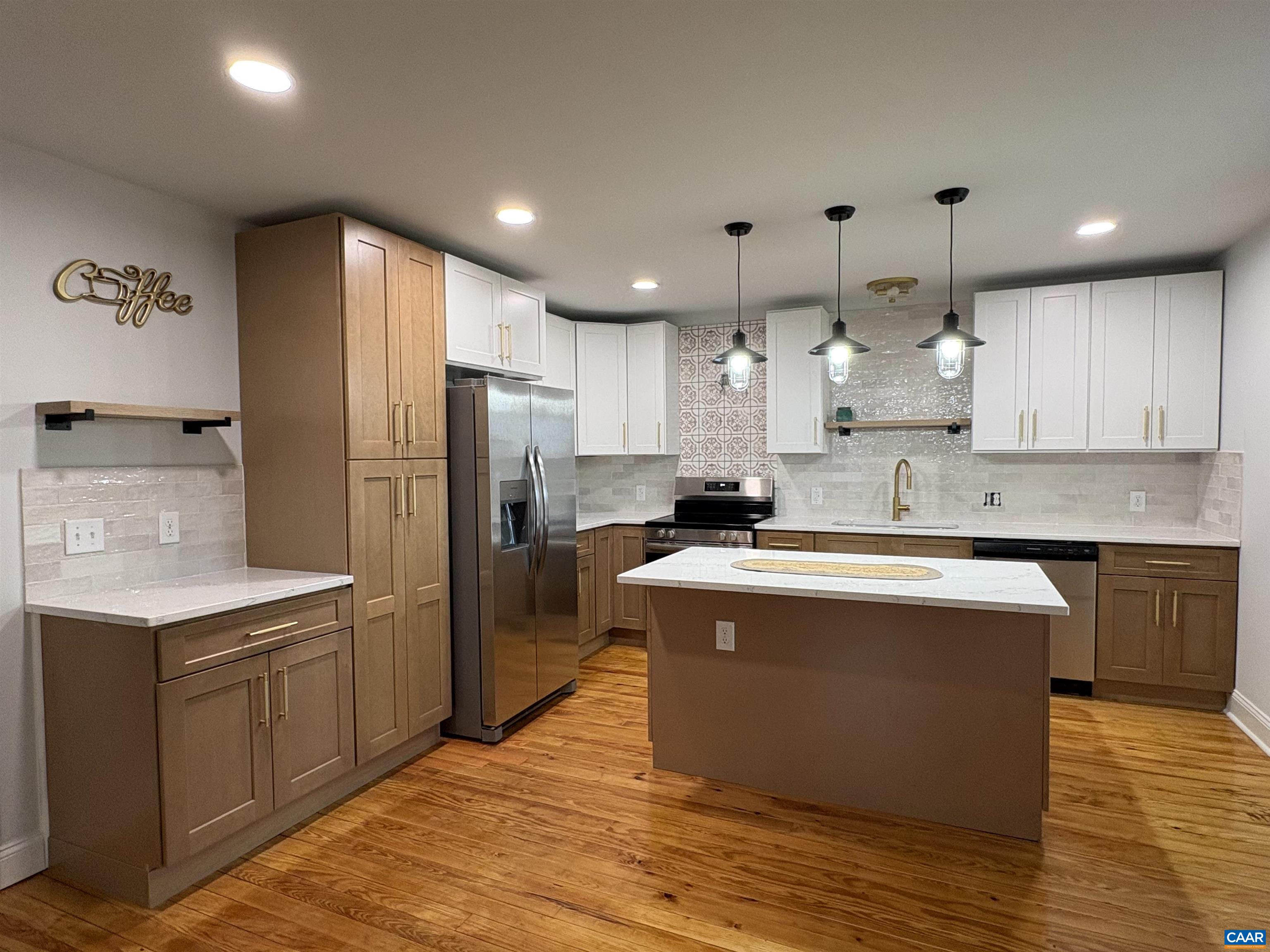 A abundance of cabinets with soft close. All new stainless steel appliances. This kitchen will not disappoint.