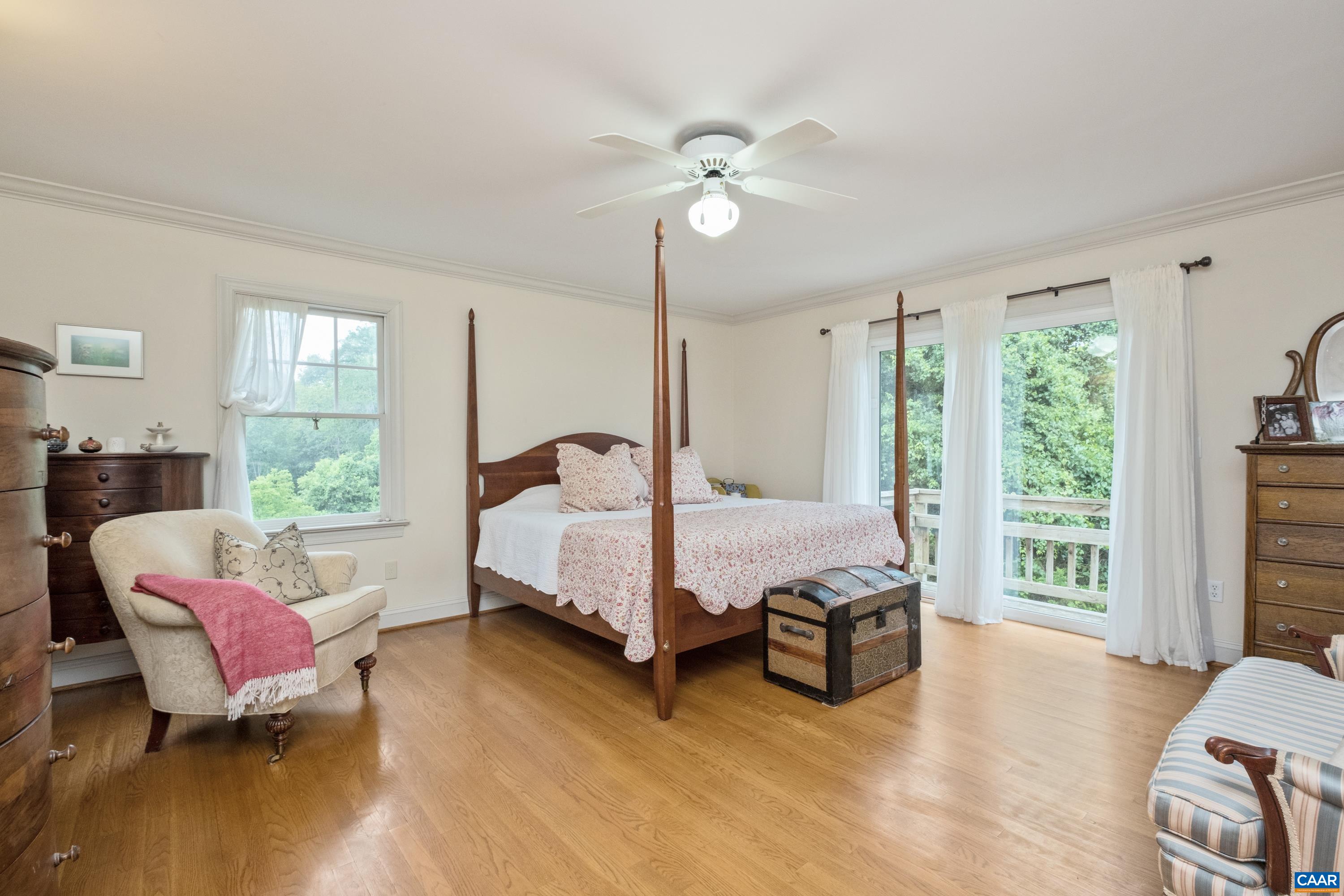 with En Suite Bath and private walk out sliding doors to back deck