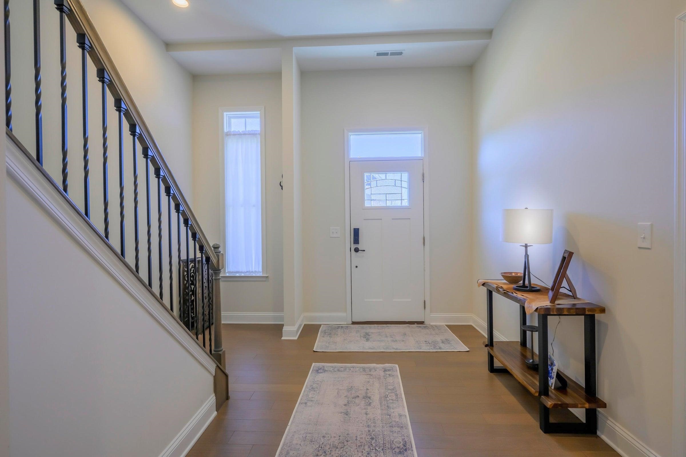 Inside you will find an inviting open floor plan with soaring 10’ ceilings on the main level and 9’ ceilings upstairs.