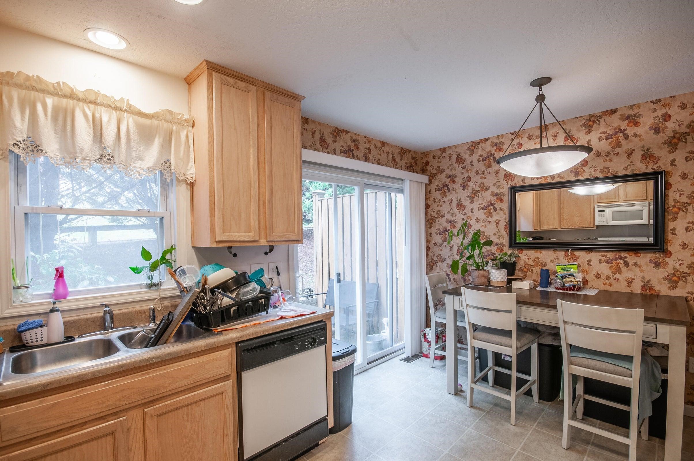 Sliding glass door opens to the back deck.