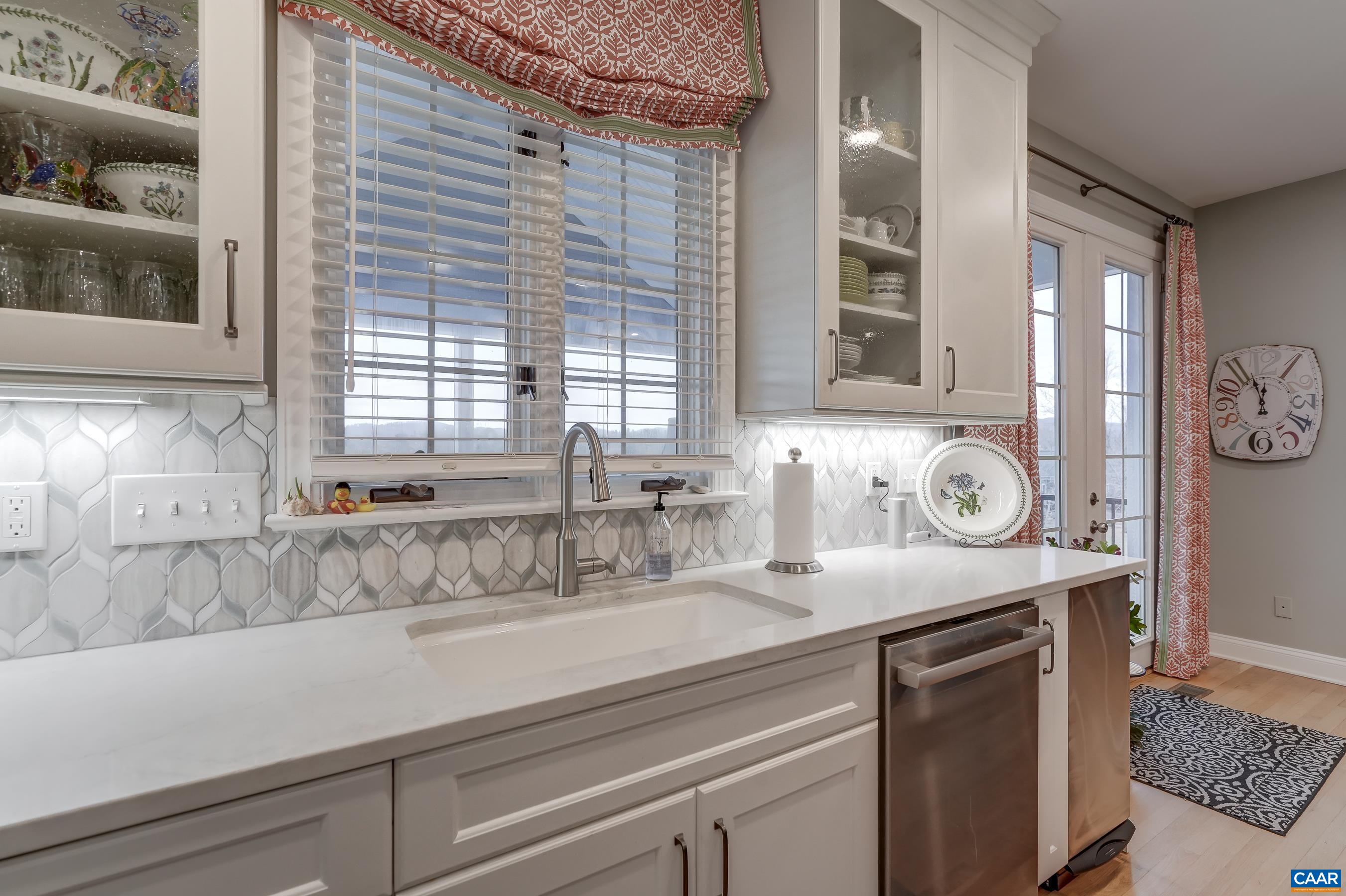 Stunning tile backsplash. Stunning tile backsplash.