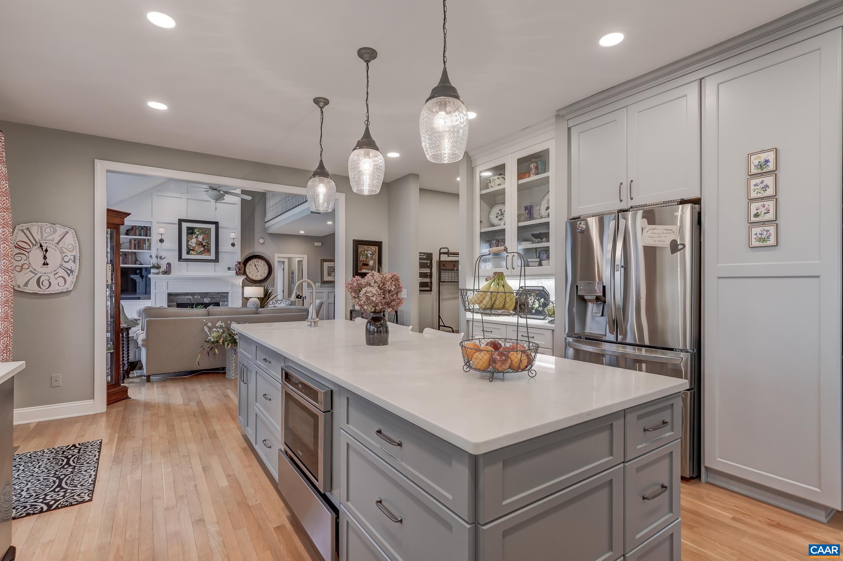 Pull out drawers throughout the kitchen provide bottom cabinet storage. Pull out drawers throughout the kitchen provide bottom cabinet storage.