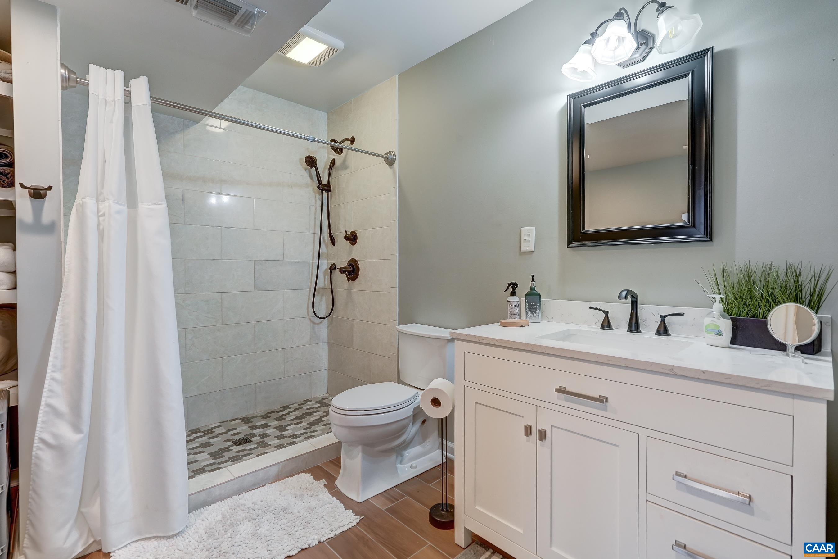 Basement full bathroom. Basement full bathroom.