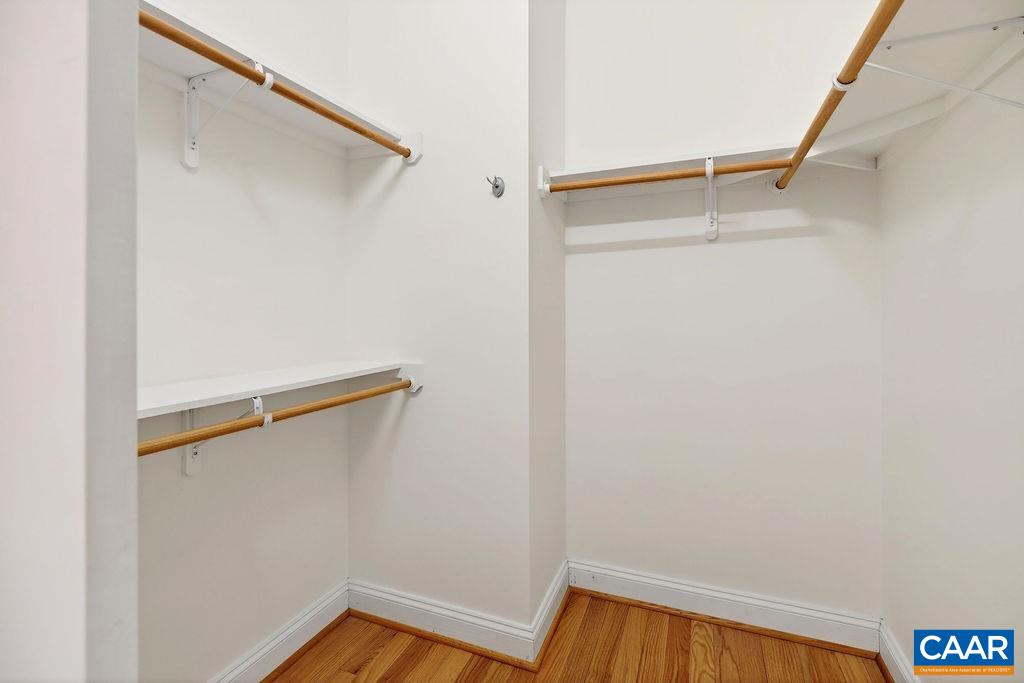 The primary suite features his and hers walk-in closets.