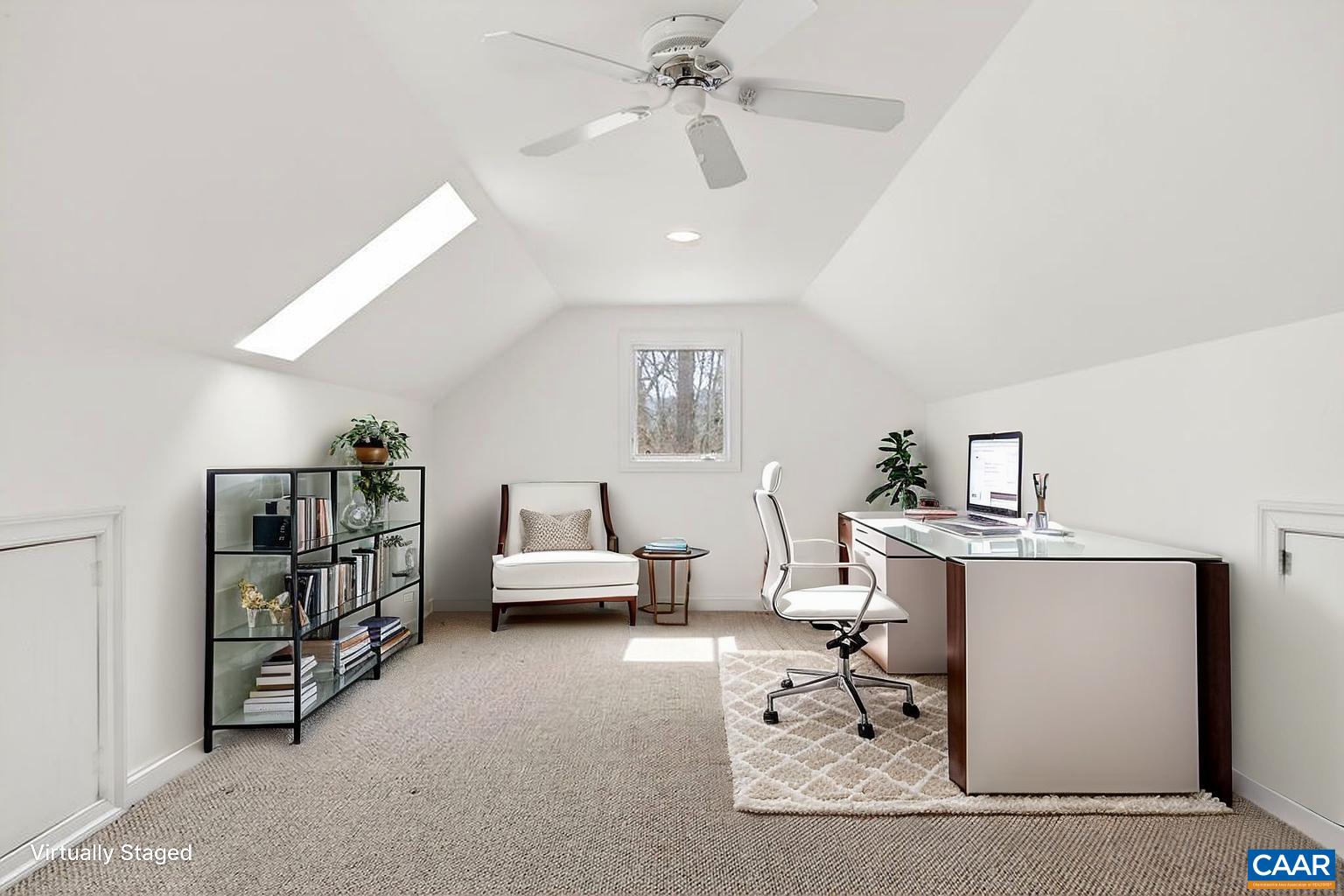 Large finished room over the garage offers versatile space for a variety of uses.