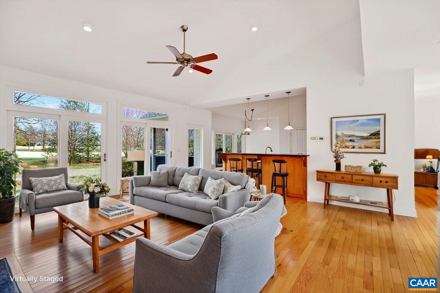 Beautiful, open, and spacious layout seamlessly connecting the great room, kitchen, and breakfast nook.