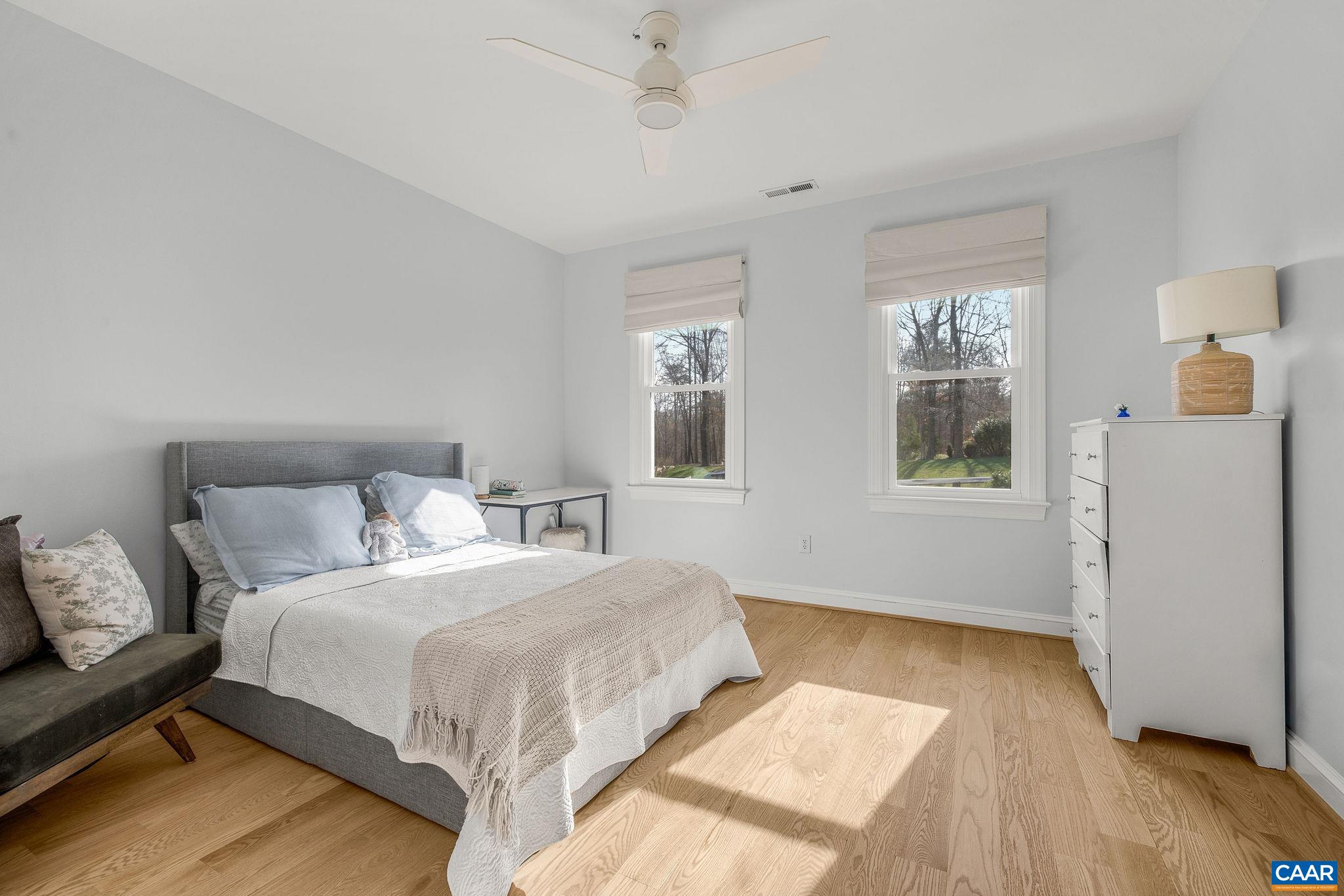 Upstairs bedroom with attached en-suite bath