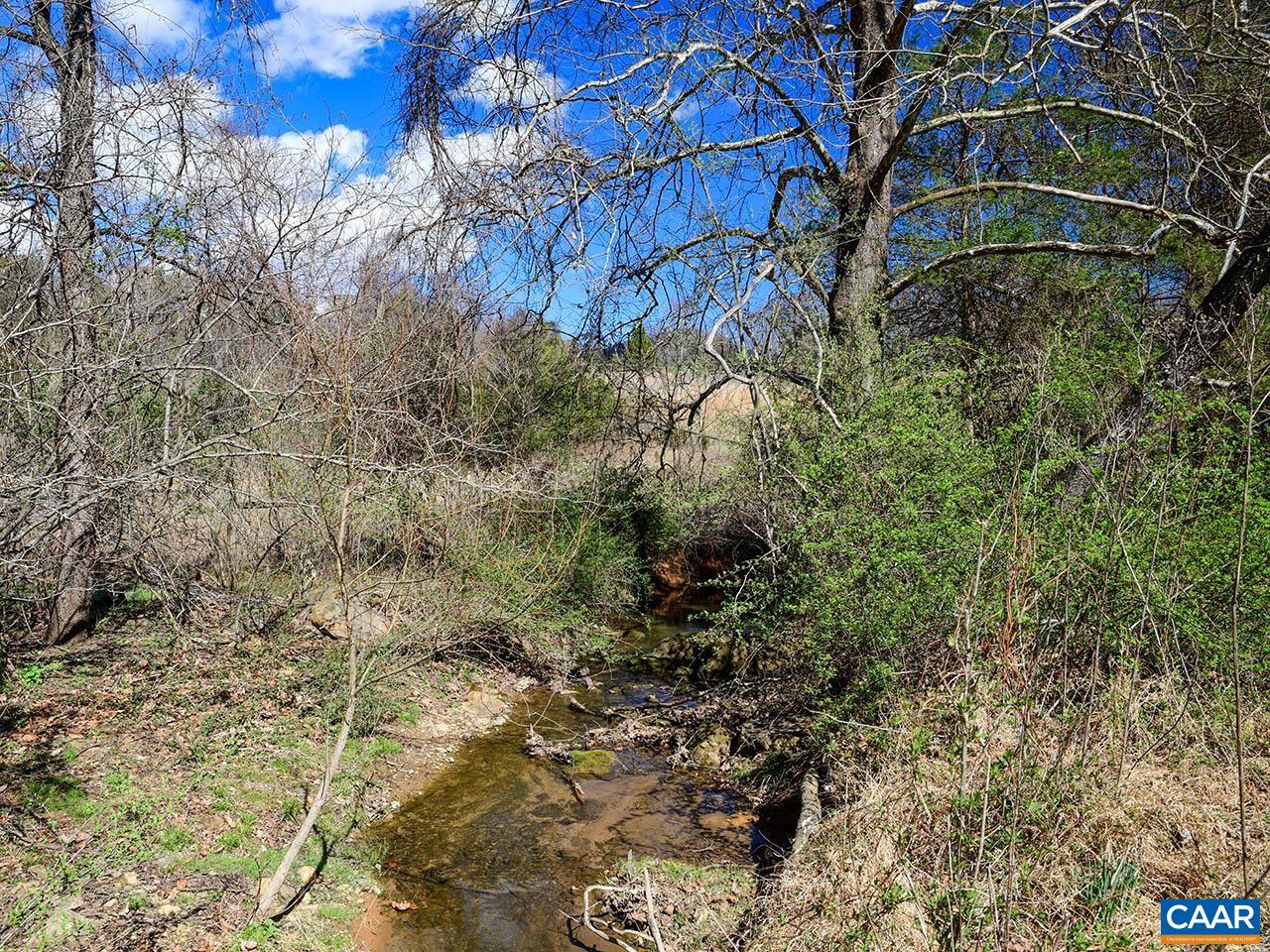 The creek runs along one of the property's boundaries. The creek runs along one of the property's boundaries.