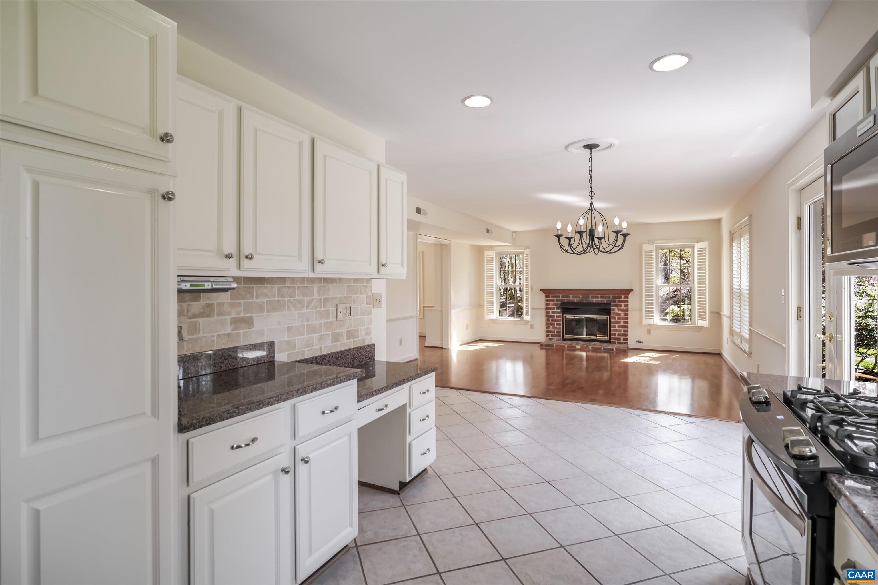 new stainless appliances, gas range, Bosch DW, tumbled limestone backsplash, pantry, built-in desk, extensive recessed lighting new stainless appliances, gas range, Bosch DW, tumbled limestone backsplash, pantry, built-in desk, extensive recessed lighting