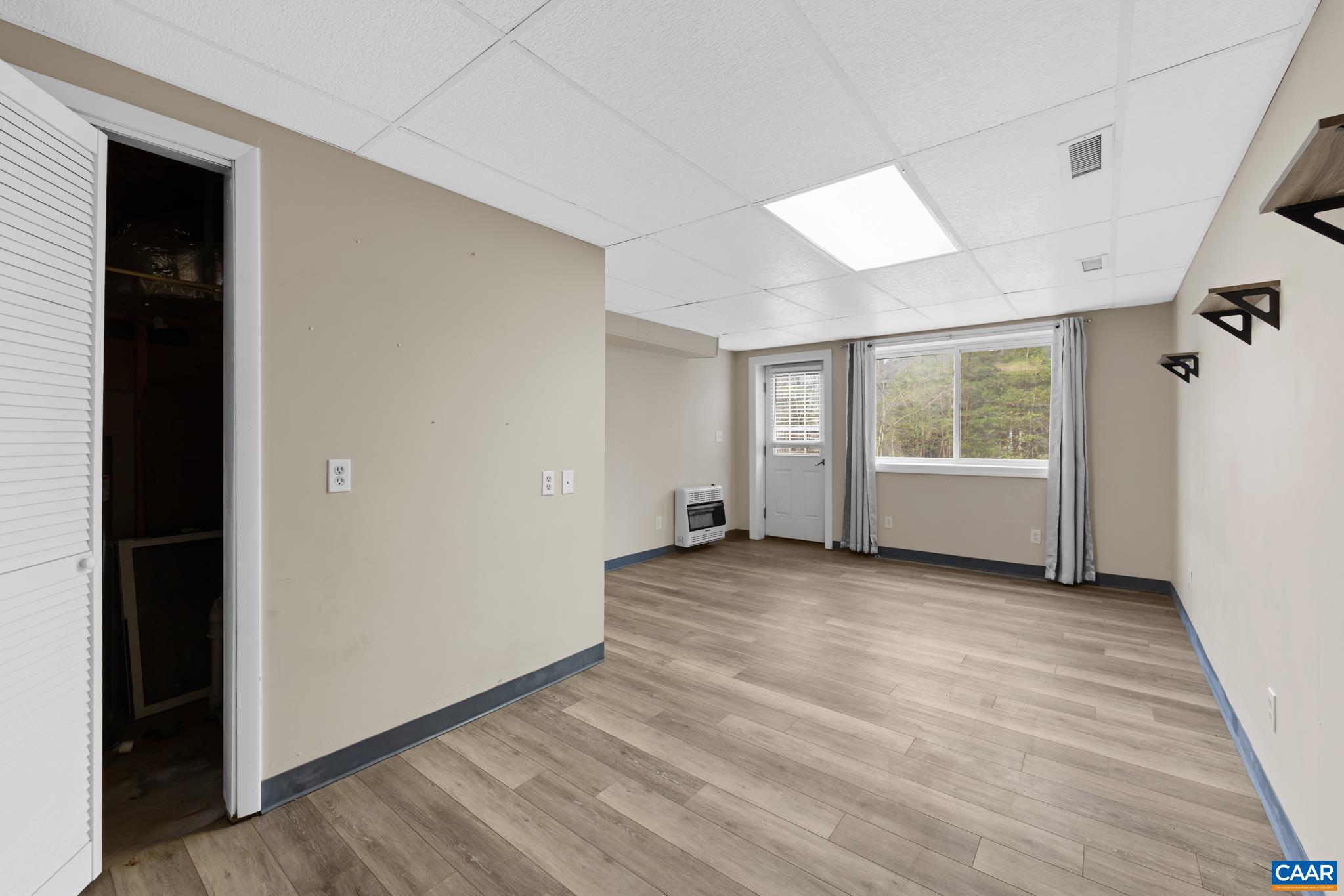 Expansive 22x12 recreation room in the walk-out basement, offering significant versatility for a gym or playroom. Expansive 22x12 recreation room in the walk-out basement, offering significant versatility for a gym or playroom.