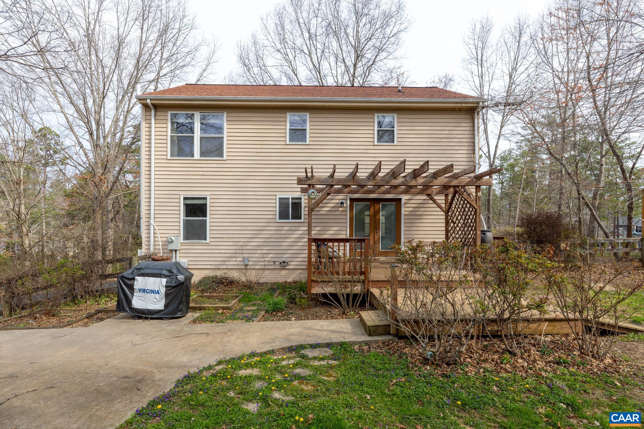 Rear deck and patio area overlooking the fenced lawn, perfect for outdoor entertaining Rear deck and patio area overlooking the fenced lawn, perfect for outdoor entertaining