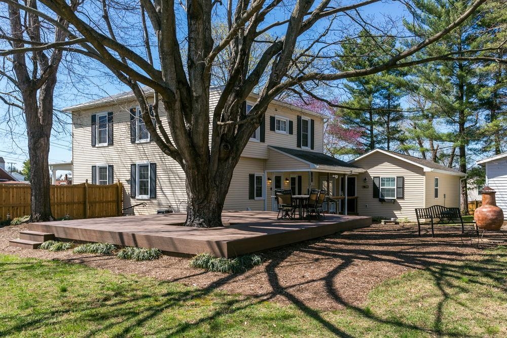 house showing extensive deck which leads into the breezeway.