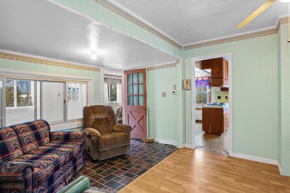 in front of enclosed porch to access kitchen