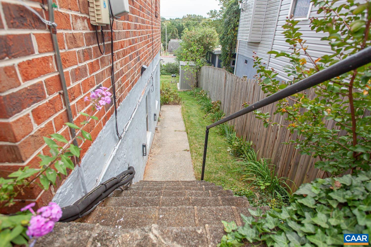 Stairs down to the generous shared yard.
