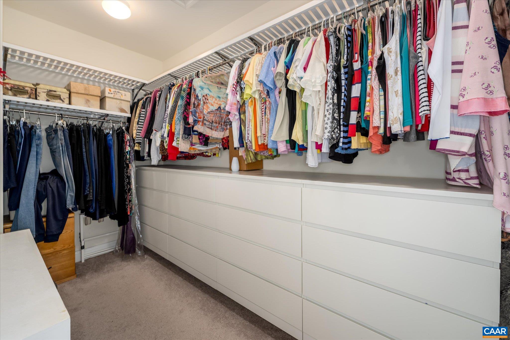 Walk in closet with custom built-ins