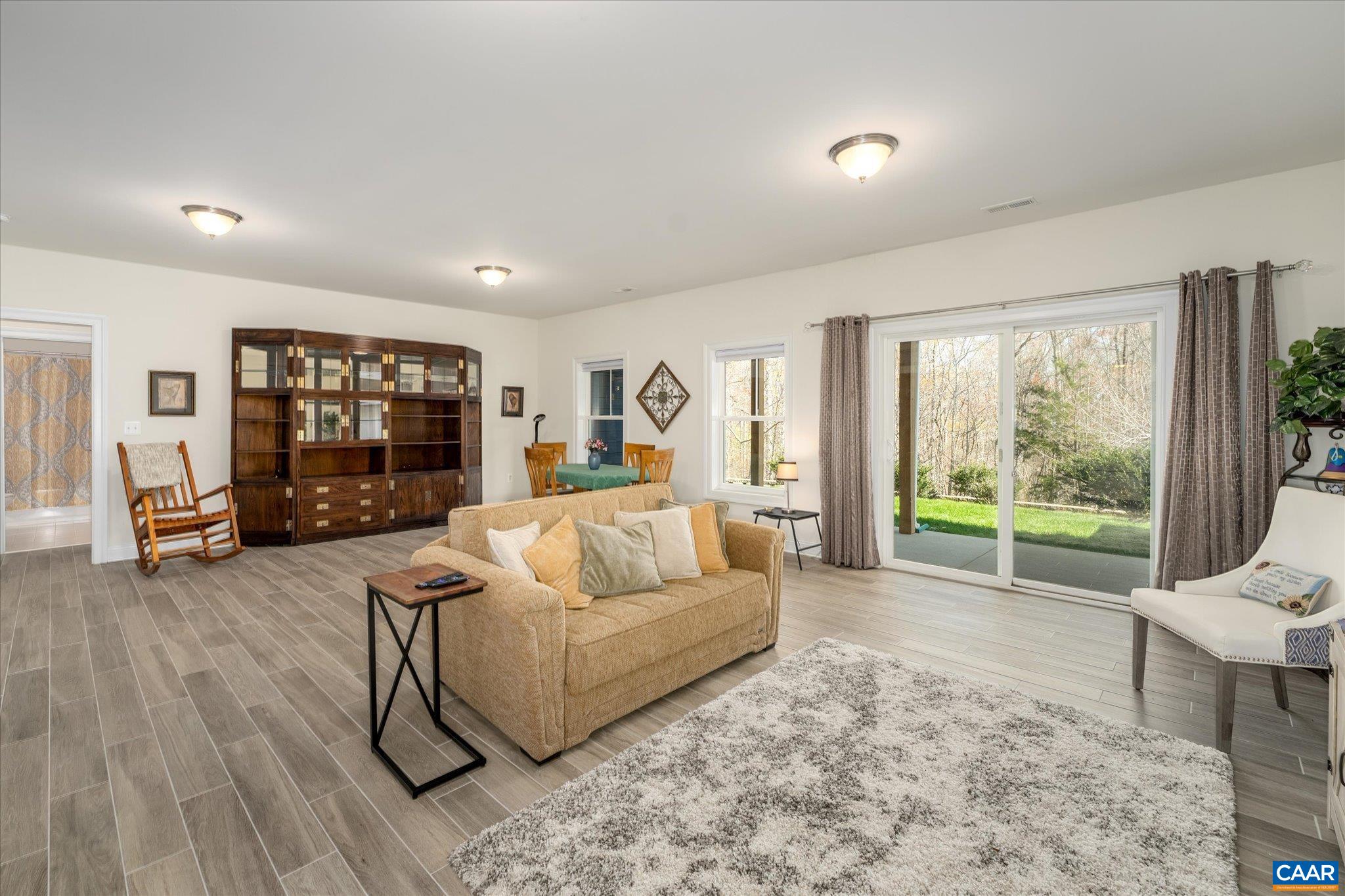 Walk out rec room with custom tile floor