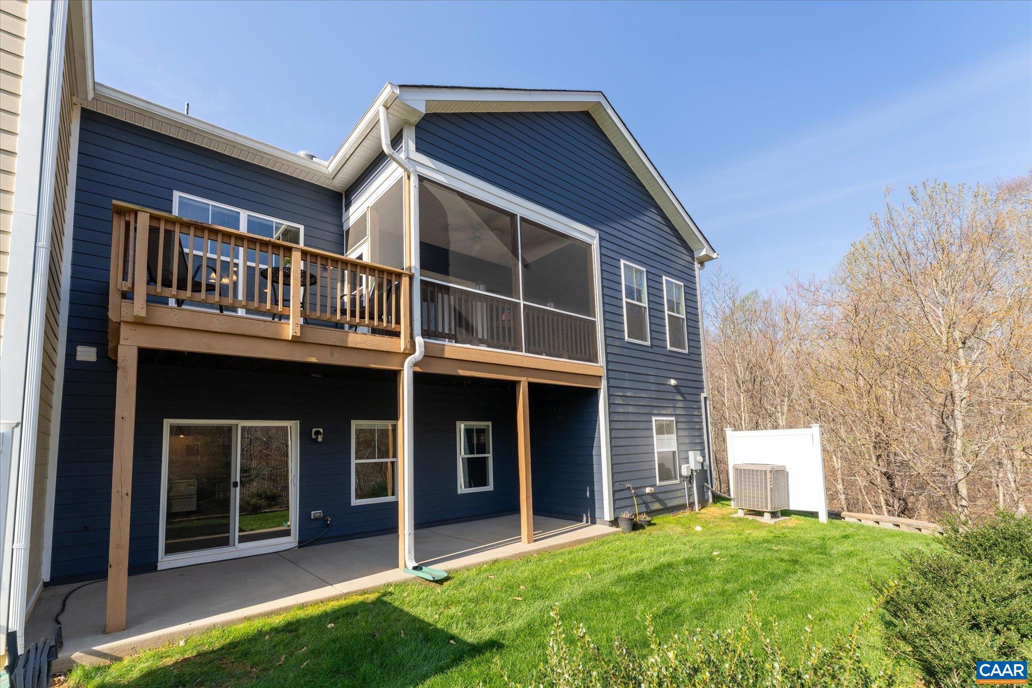 Rear view of home and yard 2