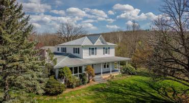 Just north of the bustling town of Elkton this hilltop home has so much to offer!