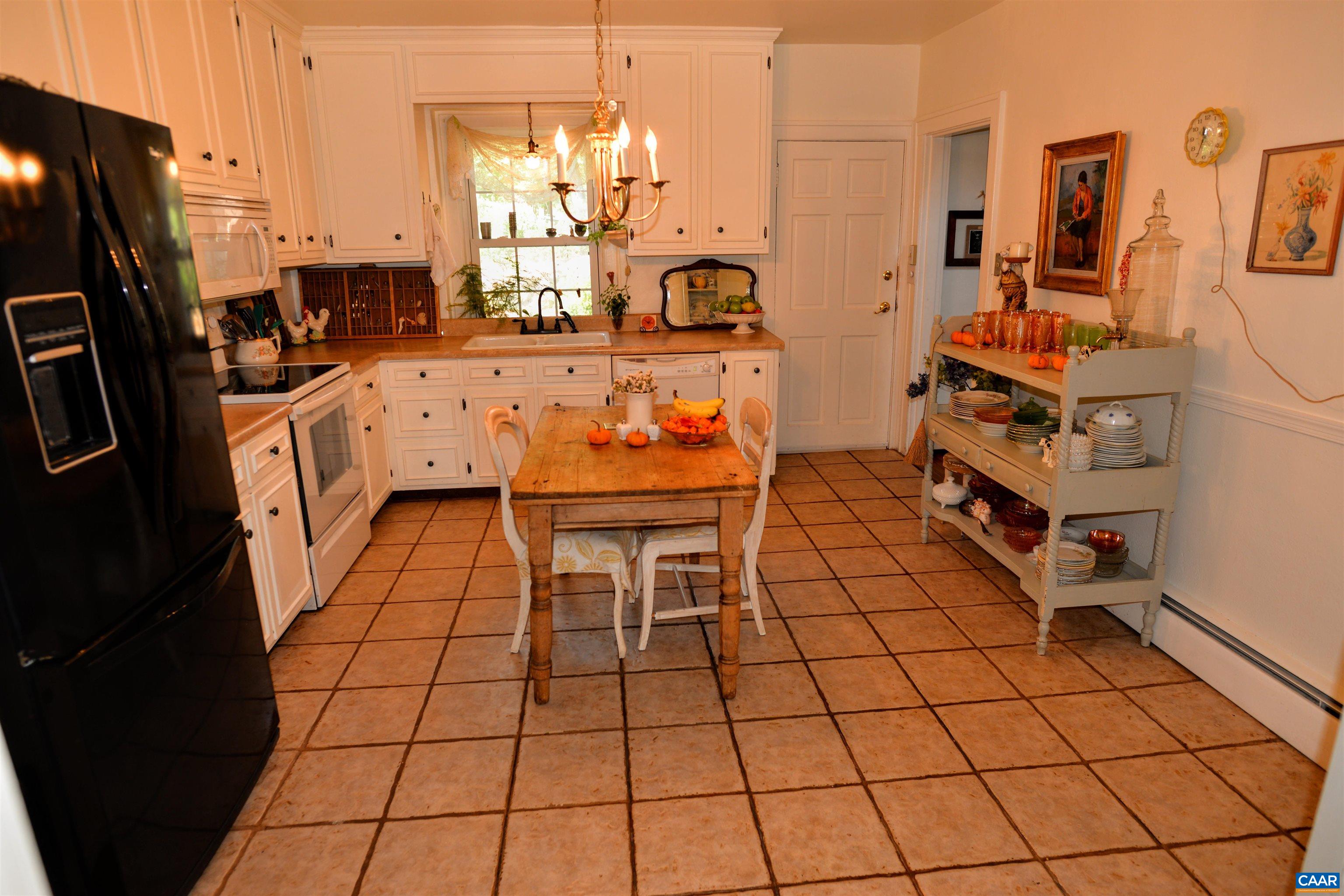 Kitchen sink overlooks waterfall.