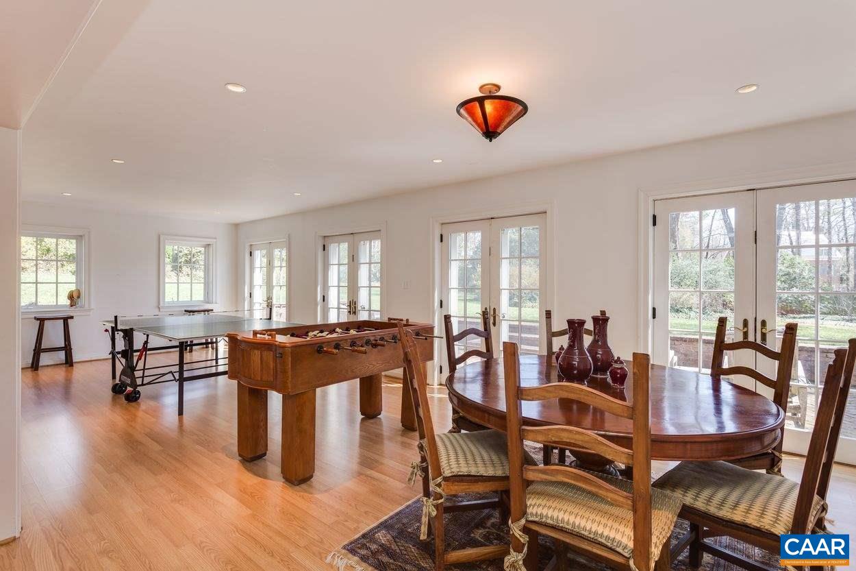 Sunny terrace level rec room or office