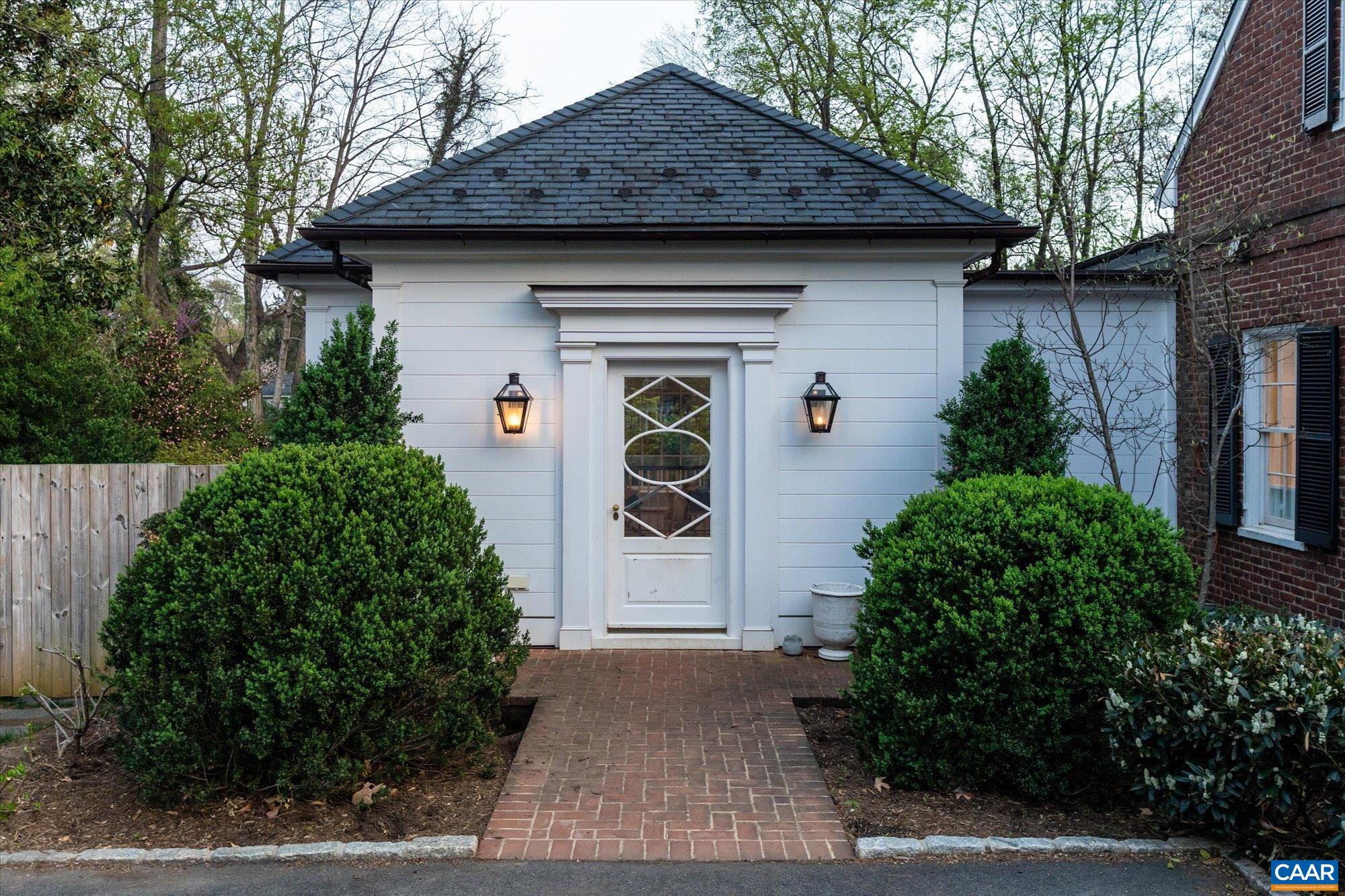 Bethany Puopolo designed mudroom and 1/2 bath addition perfectly melds with the original home
