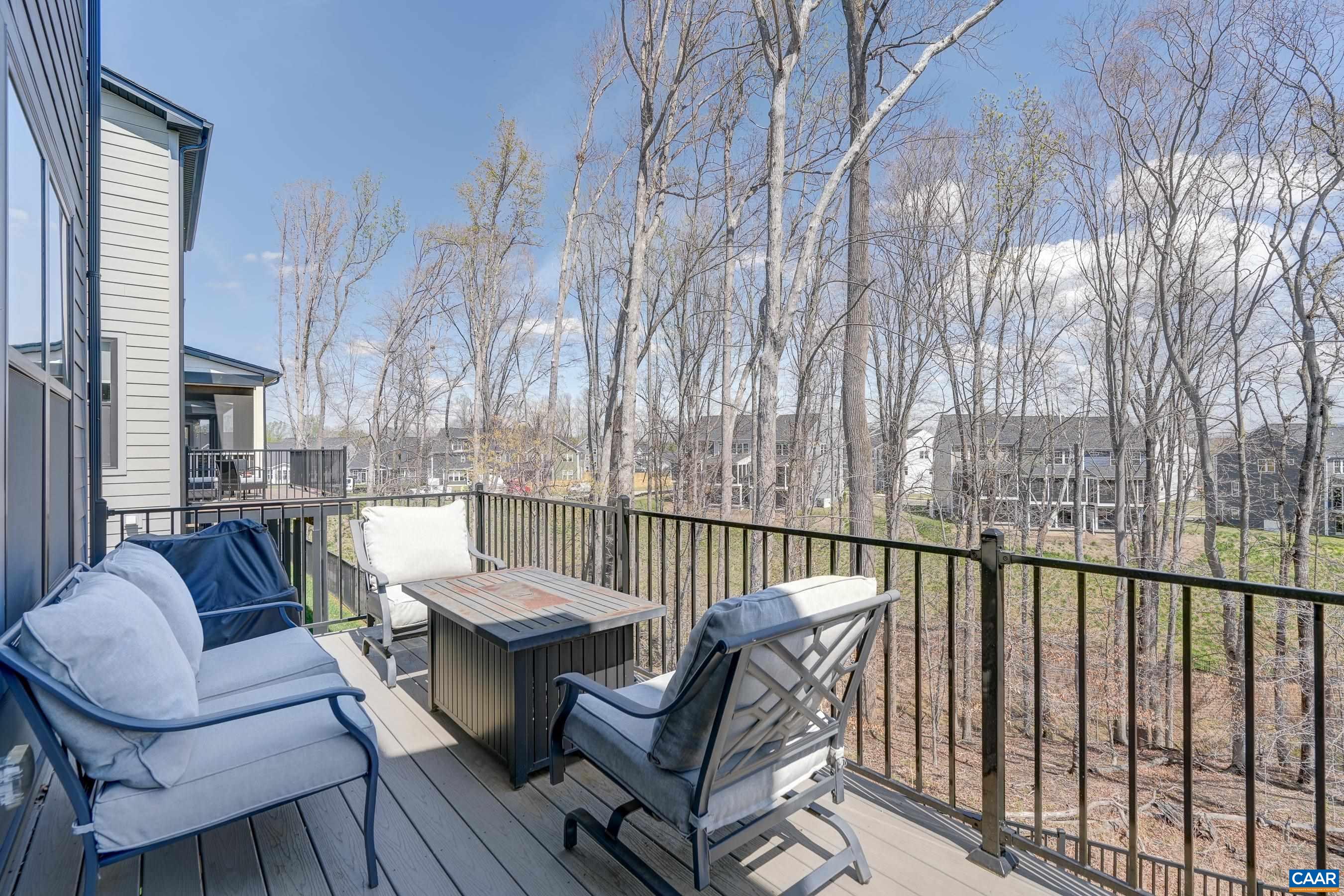 Composite deck at rear of home - great for grilling and outdoor dining!