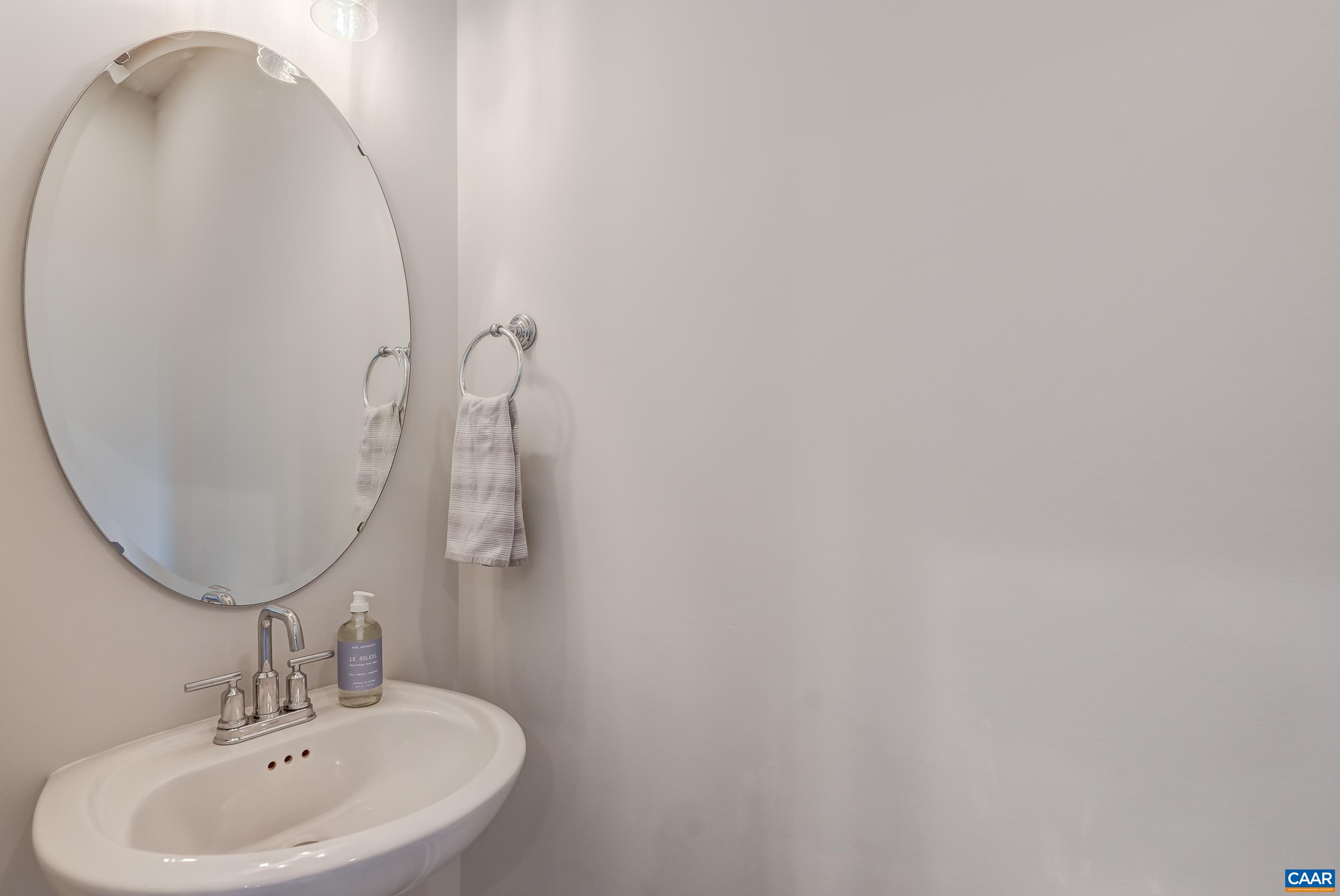 Powder room with pedestal sink.