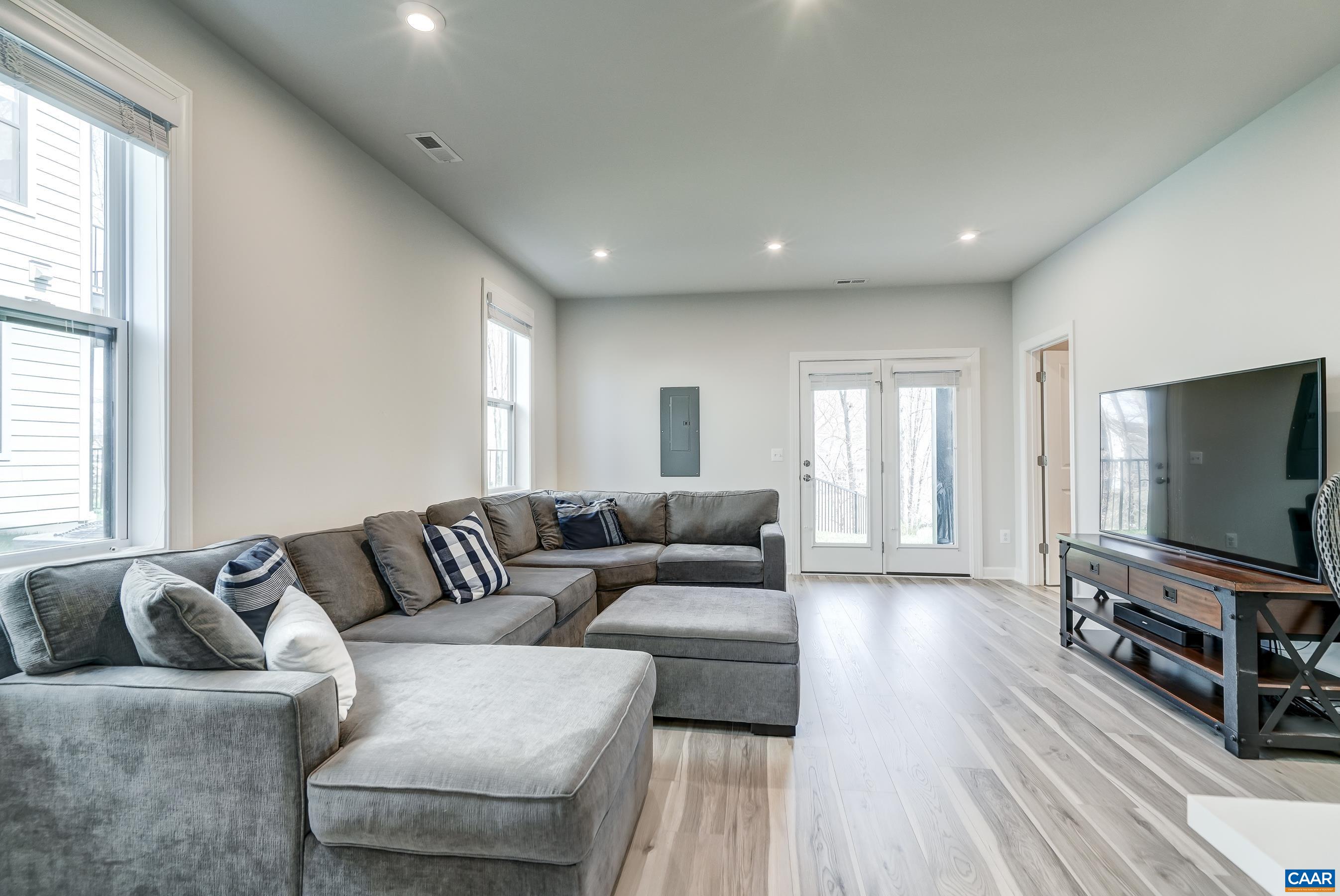 Ground floor features a large flexible space that can be a rec room/home office or guest suite!