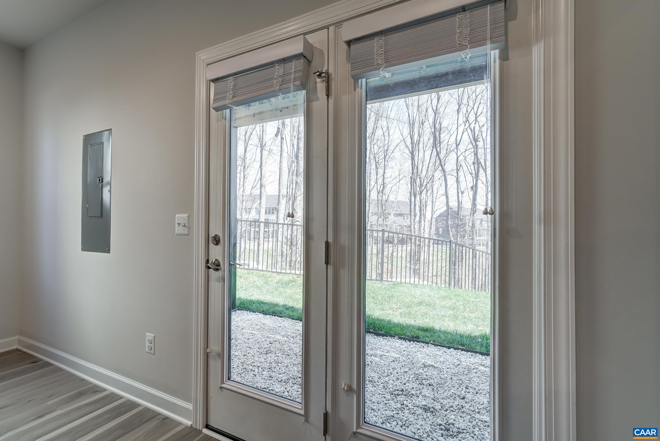 French doors lead to covered outdoor area.
