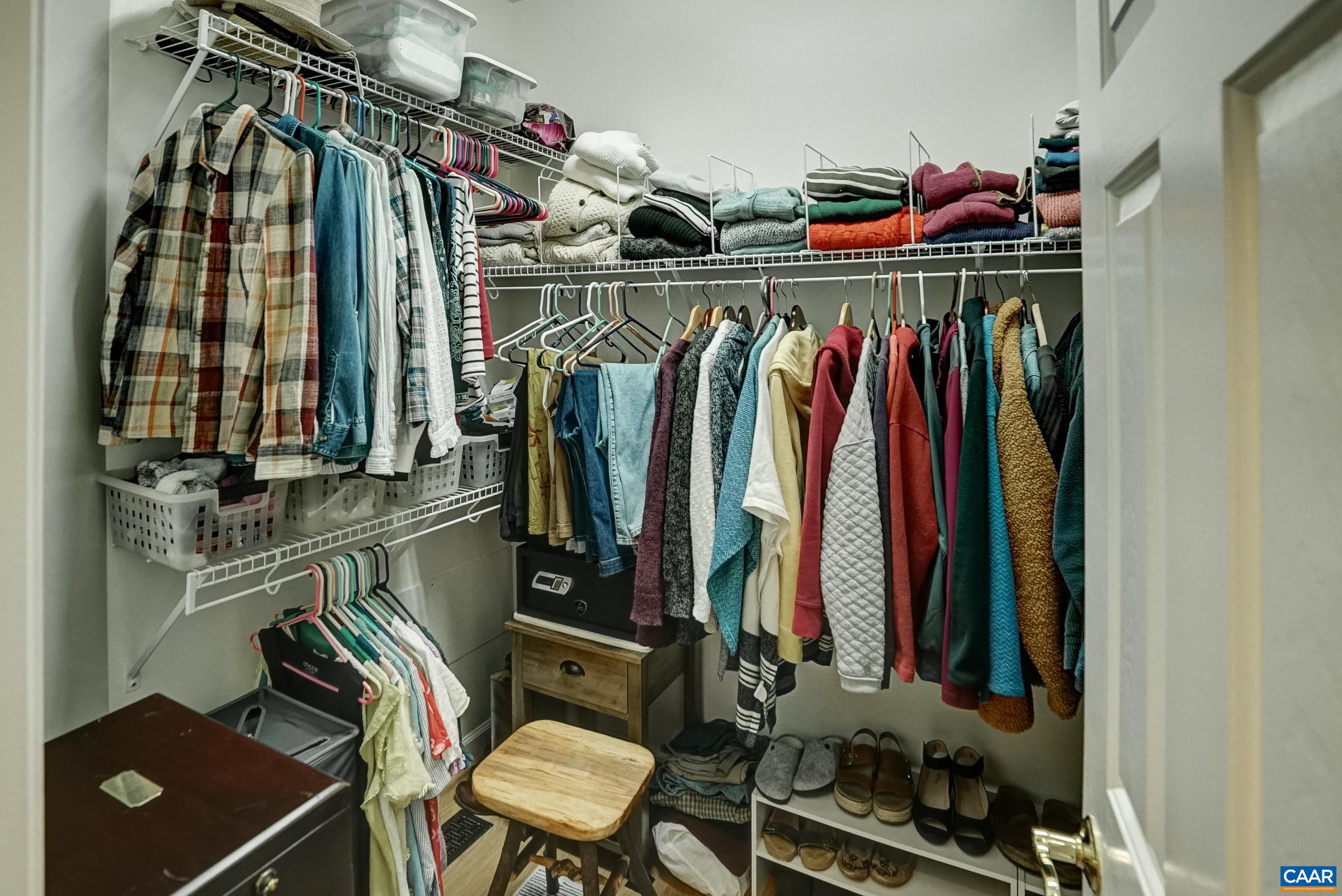 Two separate primary suite closets including one walk-in.