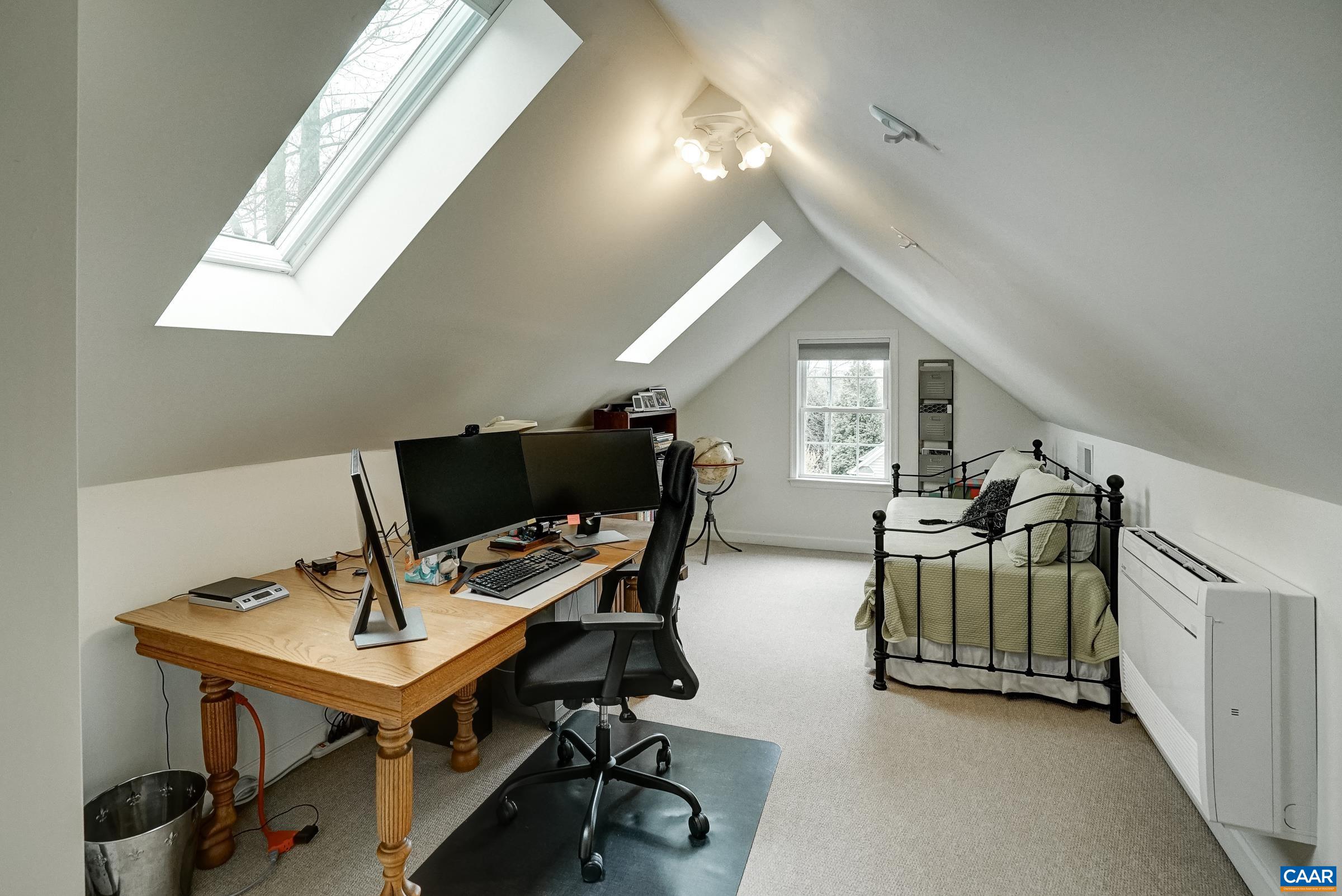Sky-lit bonus room on second floor could be a fourth bedroom, or home office!