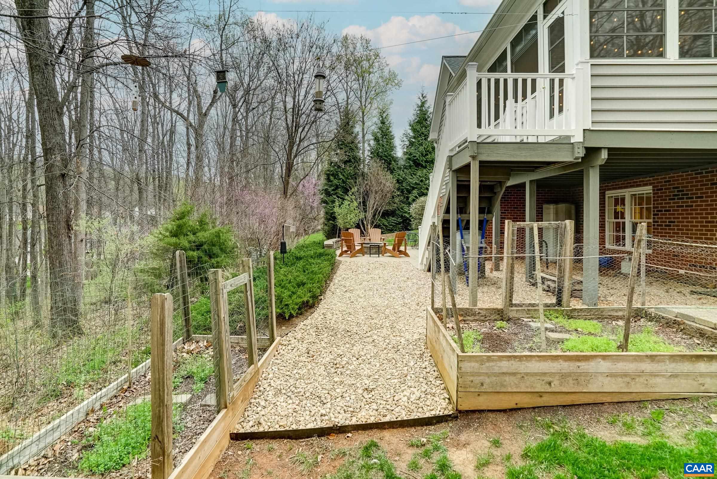 Raised bed gardens with deer fencing for the green thumbs!