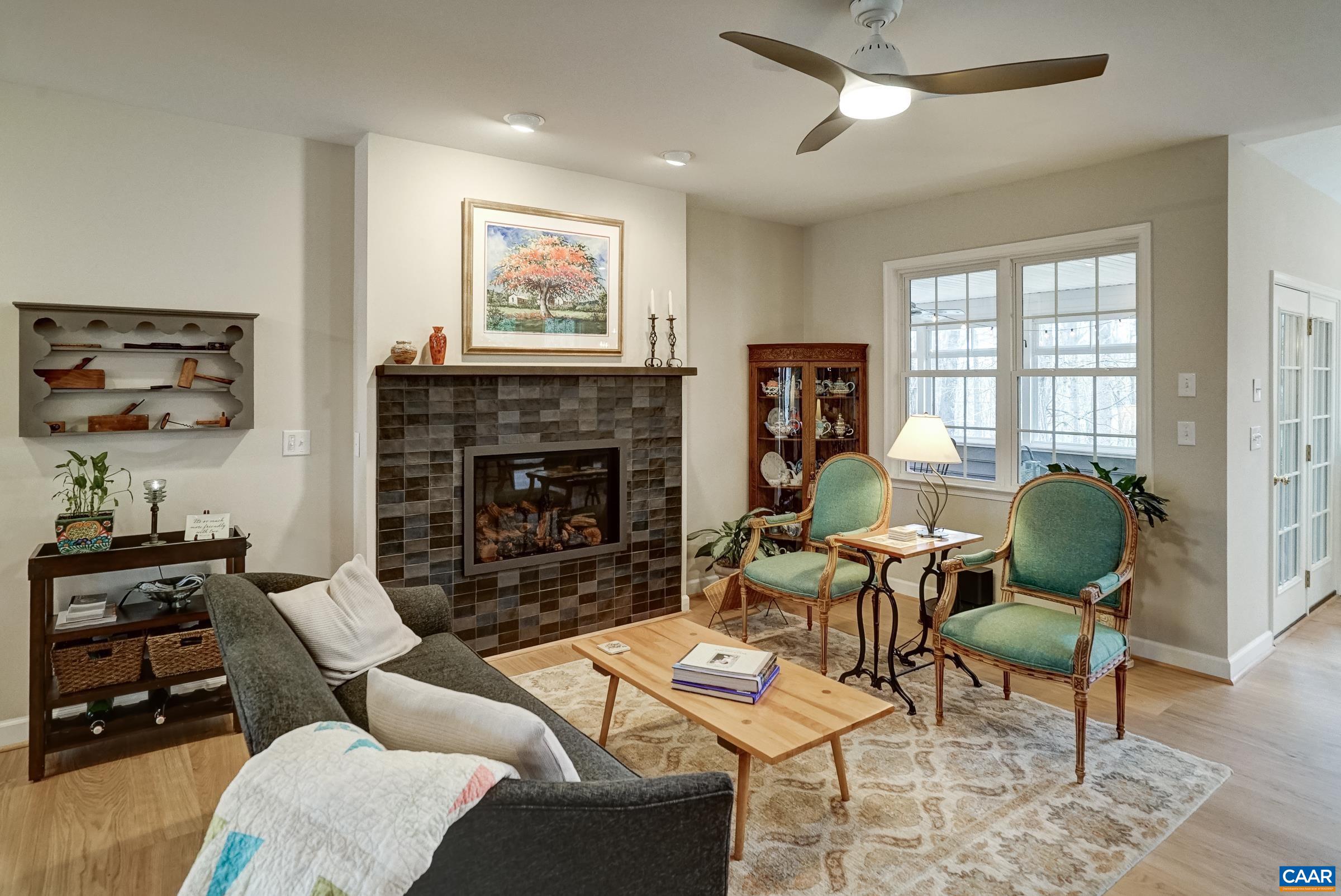 Great room features an updated (2025) gas fireplace with beautiful tile surround.