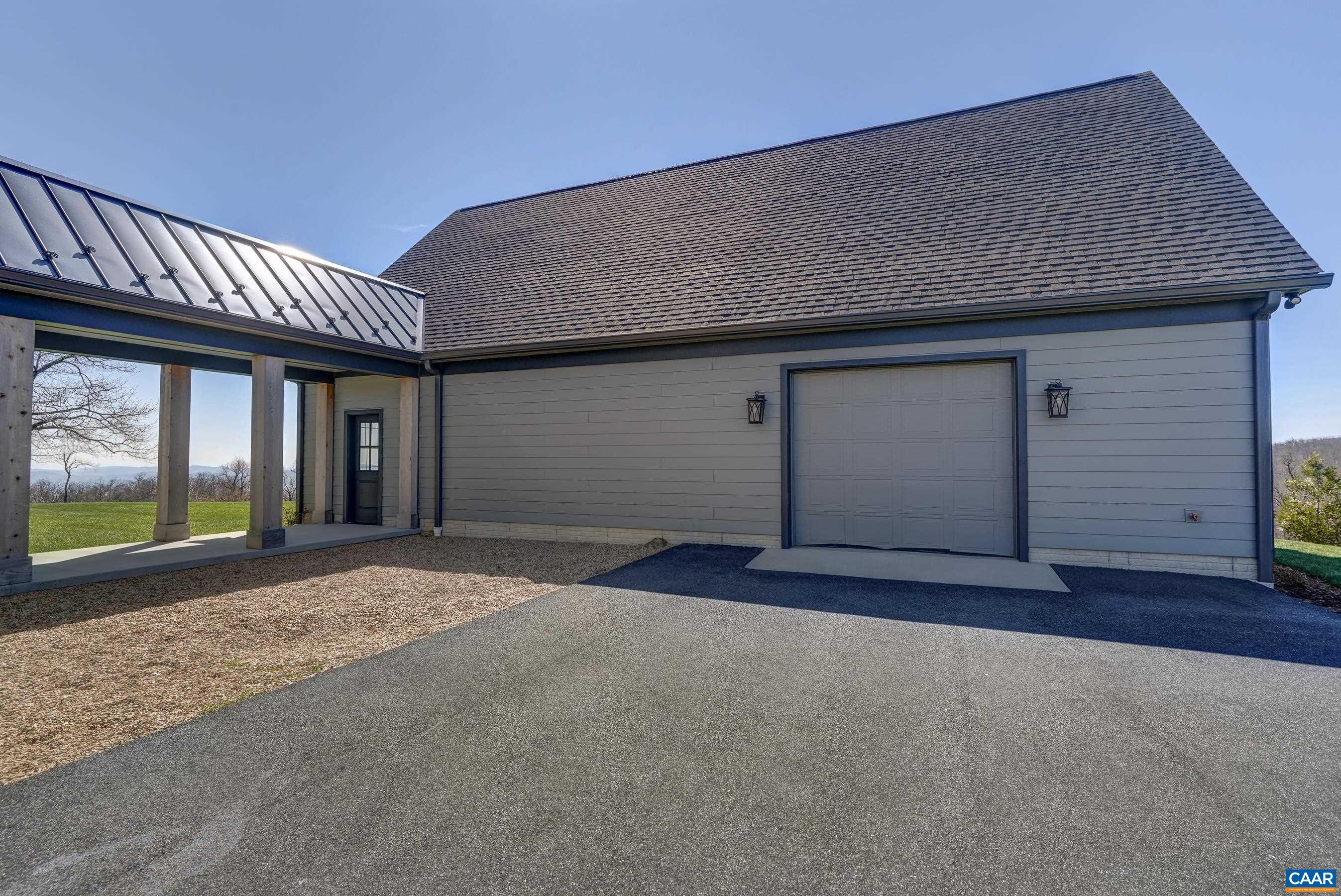 Heated & finished with half bath too!  Great for the hobbyist or car collector.