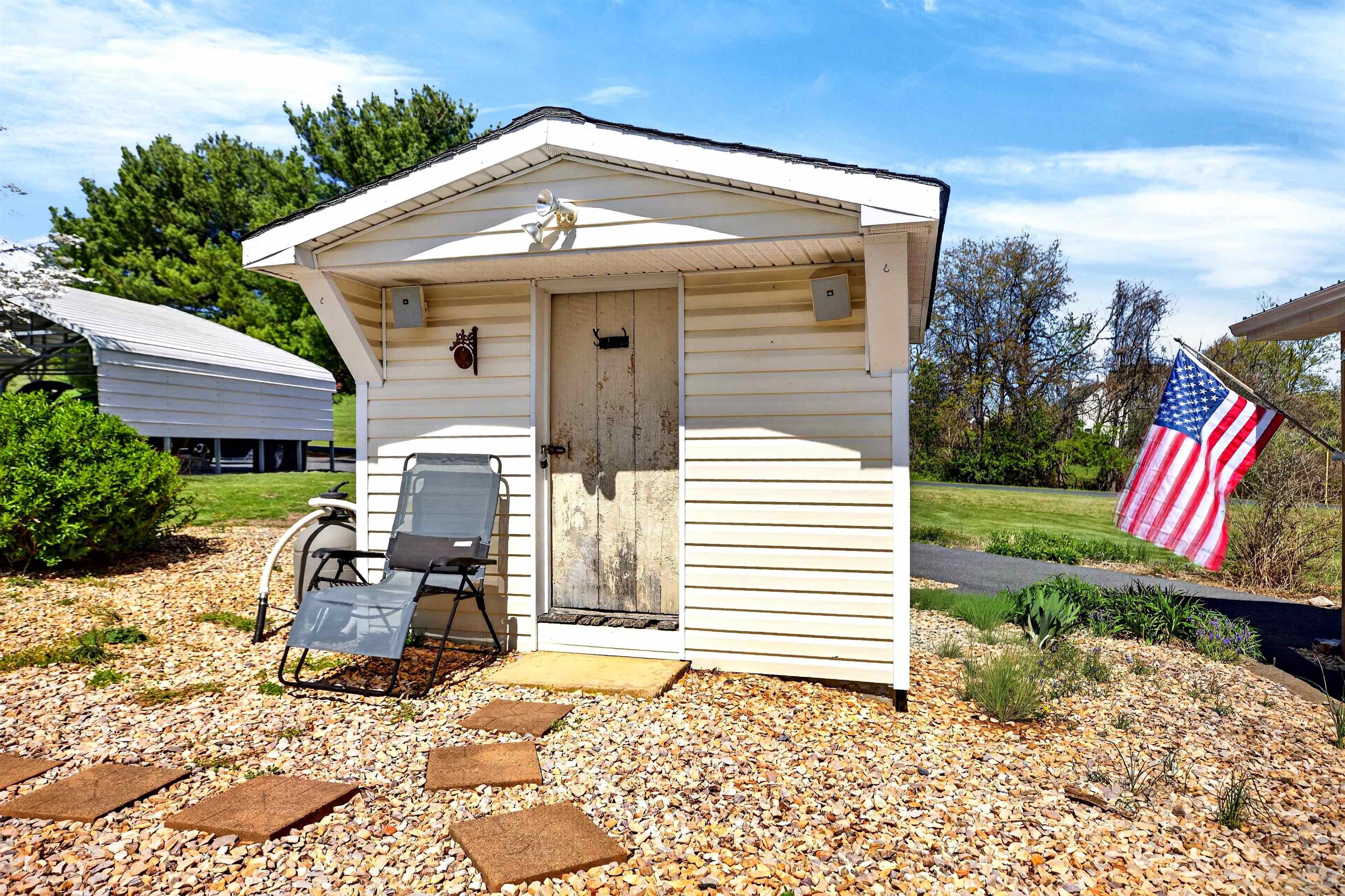 Poolside structure offering flexible use for storage